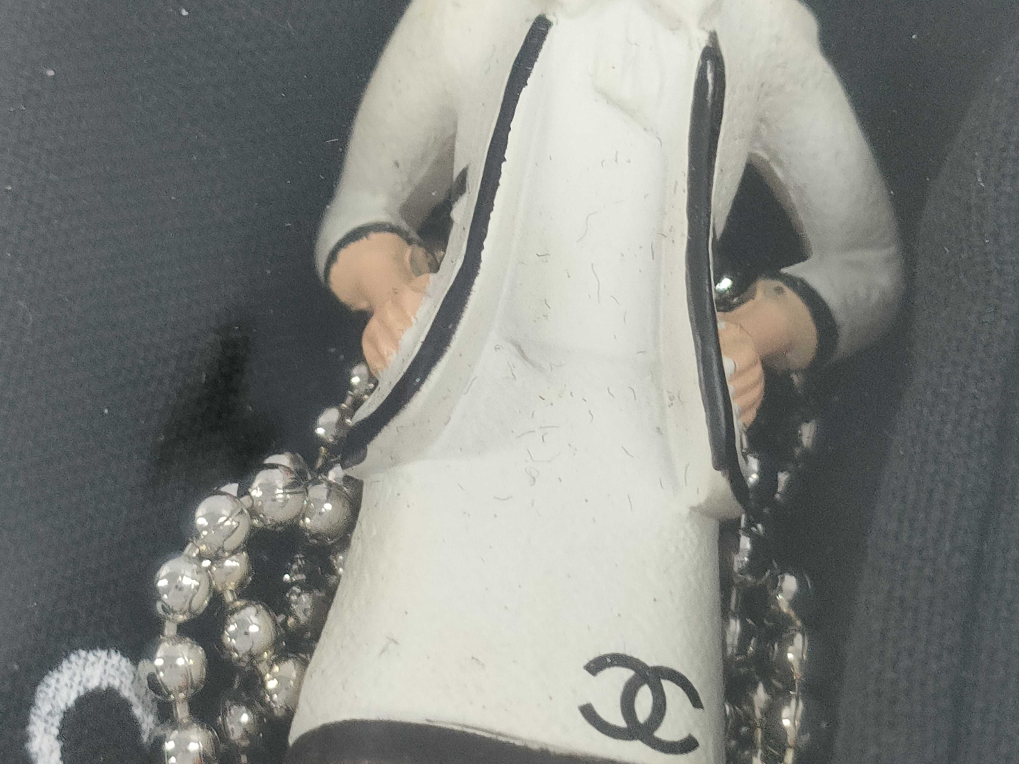 Chanel Coco Doll Figurine Pendant Necklace and Animation Booklet