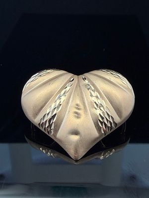 14K Yellow Gold Puffed Heart Pendant. Pendant does show some small dents. Weighs 2.2 grams.