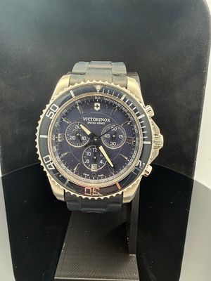 Victorinox Swiss Army Swiss Made Chronograph Watch. Good conditon does have a scuff on bezel. 