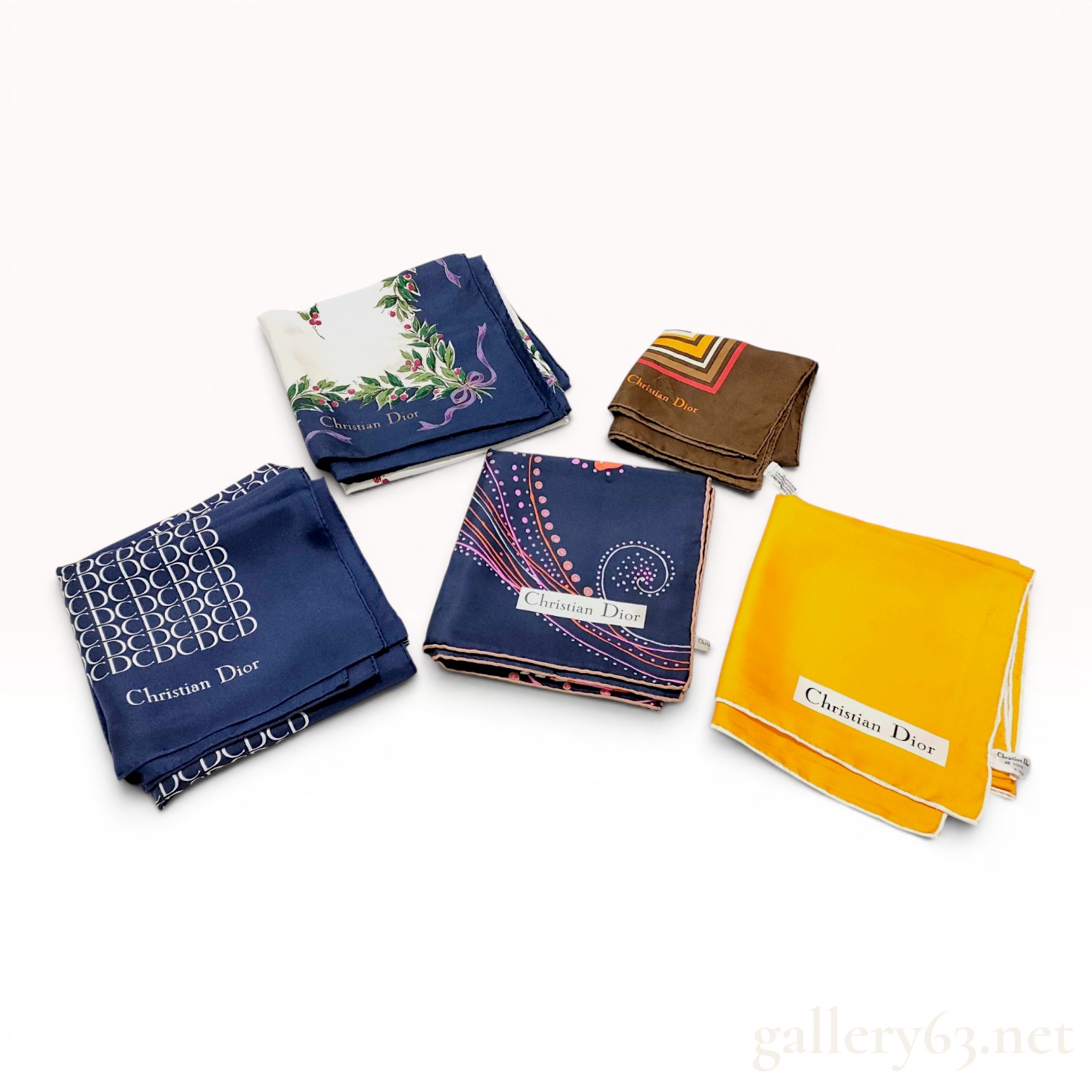 A Group of Five Christian Dior Silk Scarves