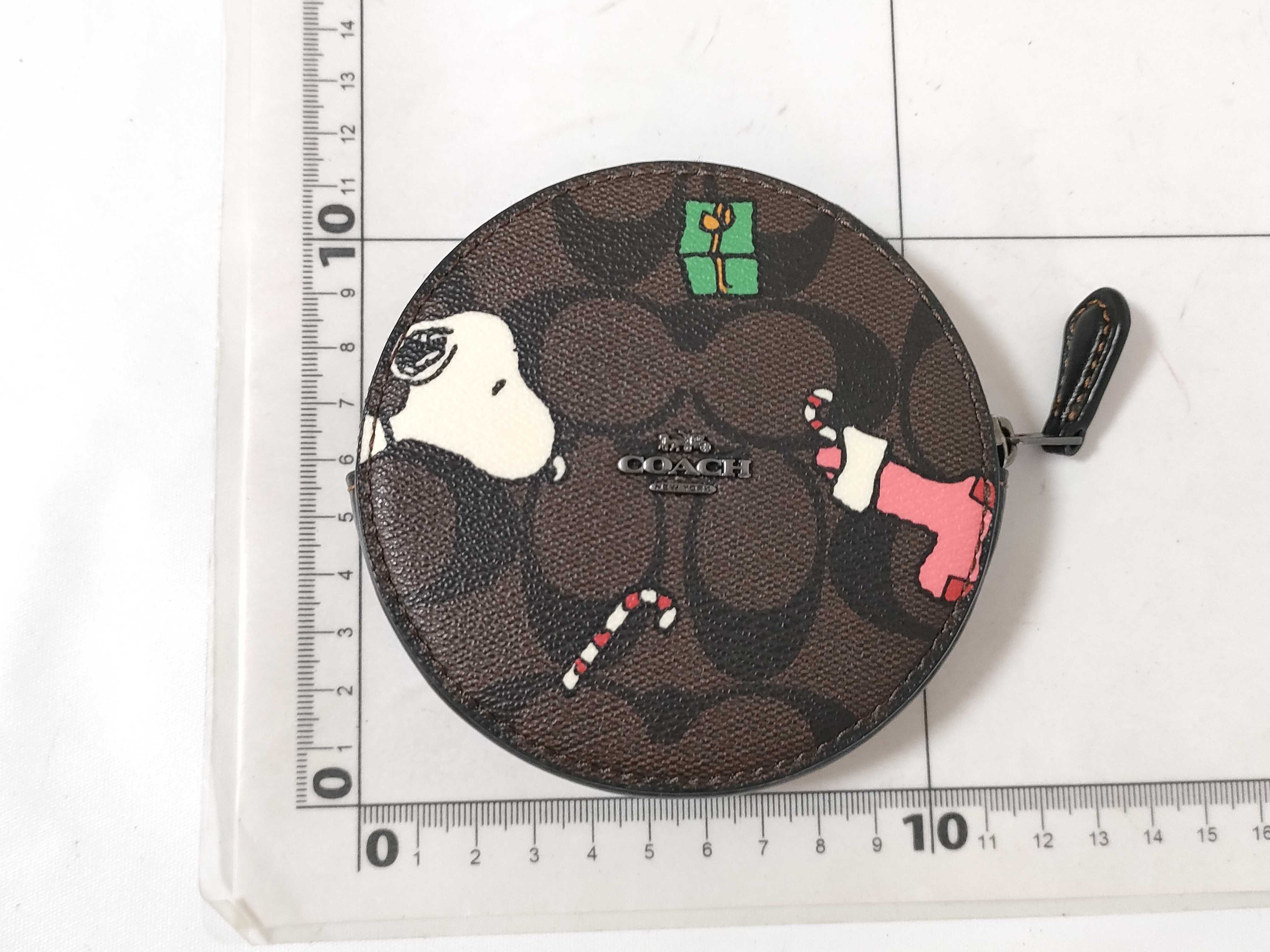 Coach x Peanuts Round Coin Case in Signature Canvas with Snoopy Presents Print
