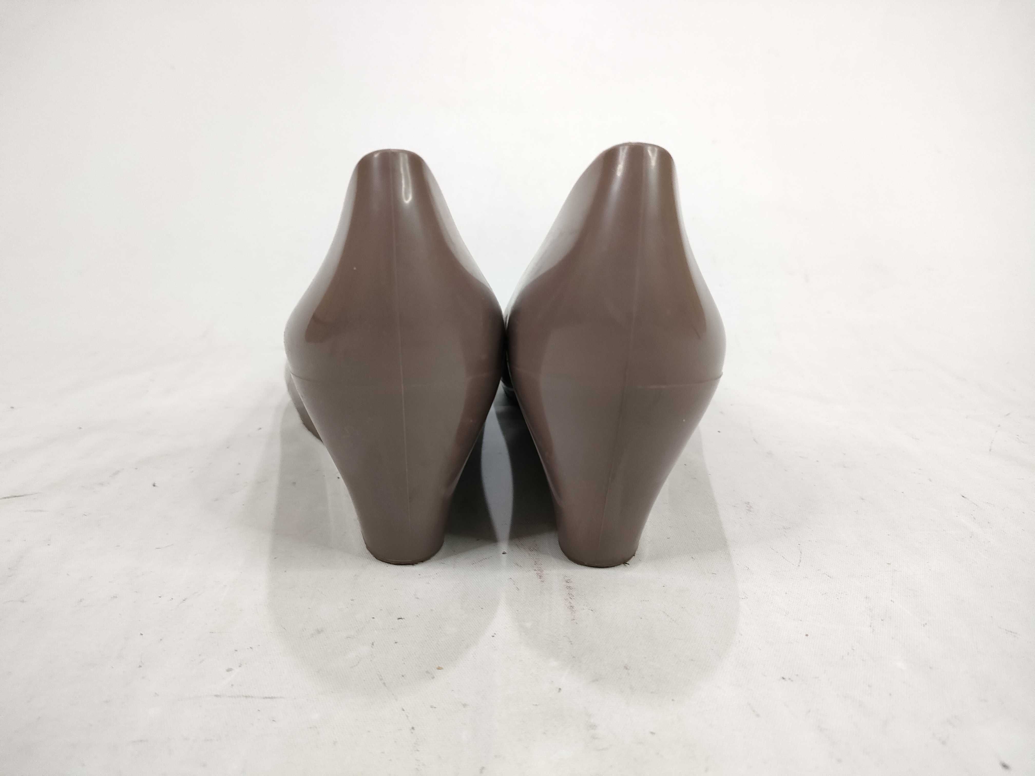 A Pair of Gucci Marola Jelly Wedge Pumps