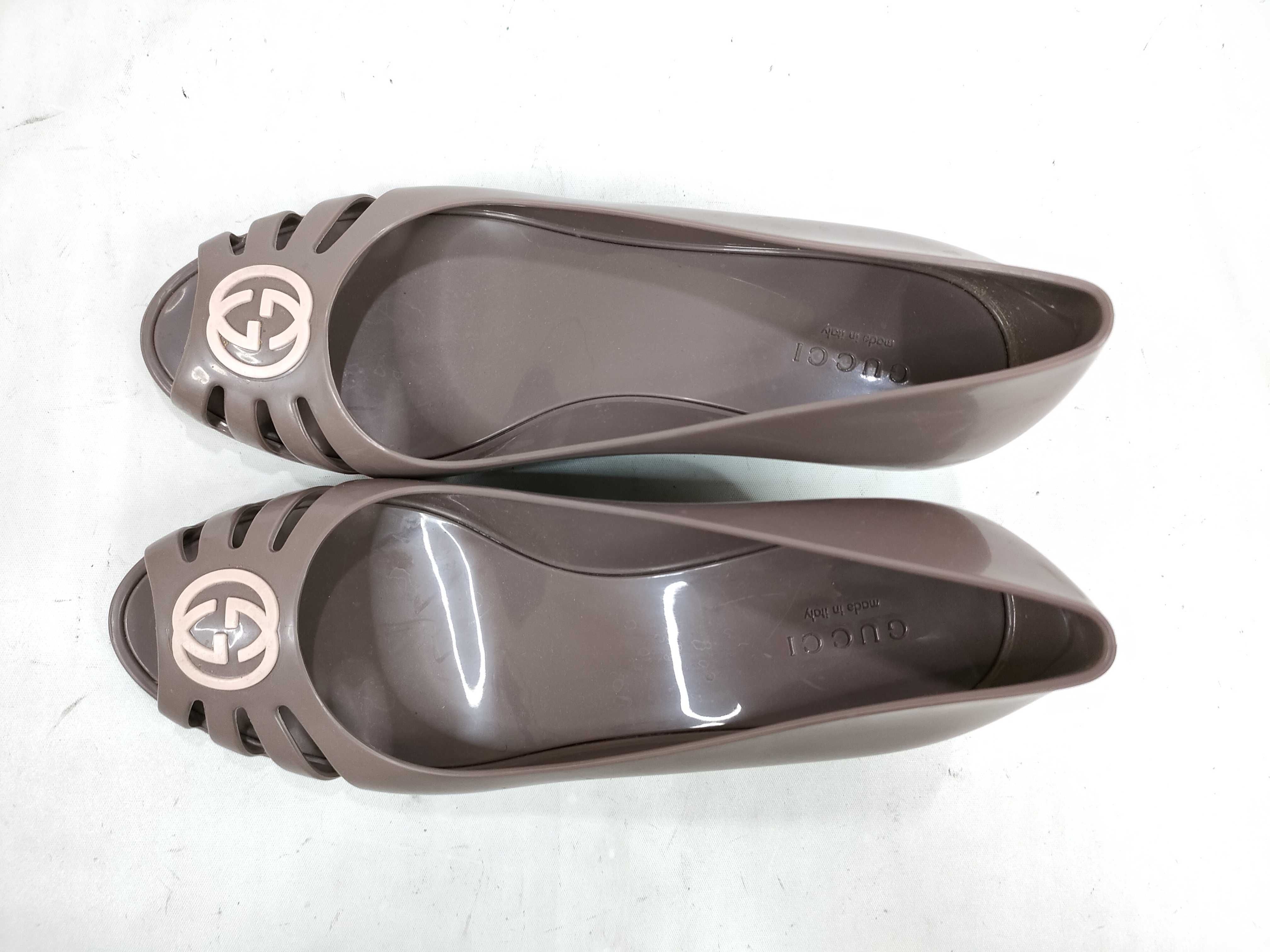 A Pair of Gucci Marola Jelly Wedge Pumps