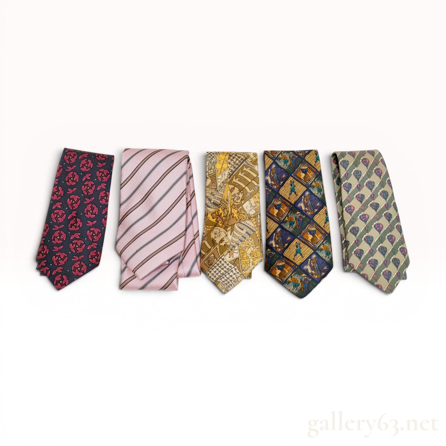 A Collection of Five Designer Silk Neckties Including Hermes, Celine, and Burberry