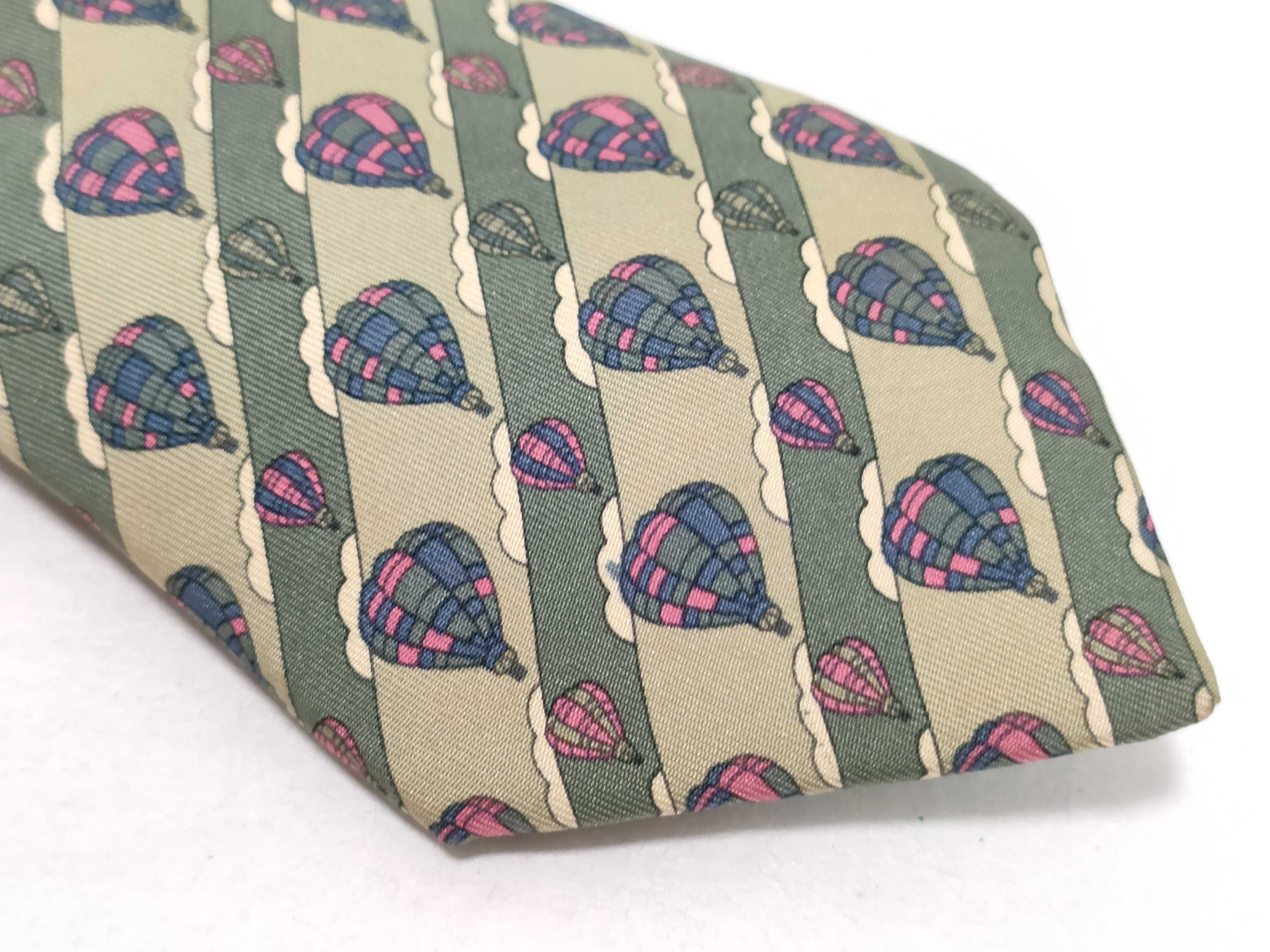 A Collection of Five Designer Silk Neckties Including Hermes, Celine, and Burberry