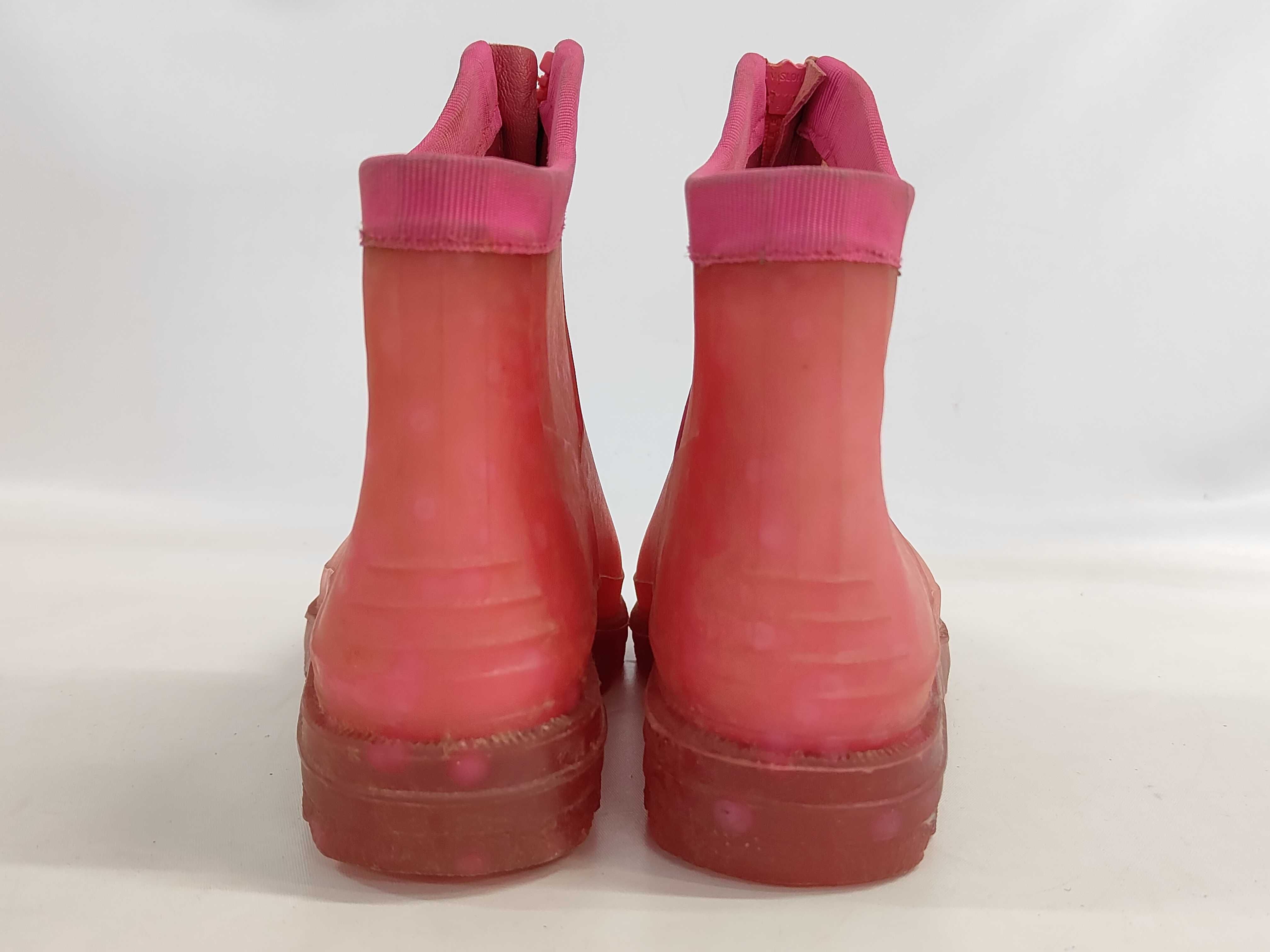 A Pair of Chanel Pink Polka Dot Translucent Rubber Front Zip Ankle Rain Boots Size 38