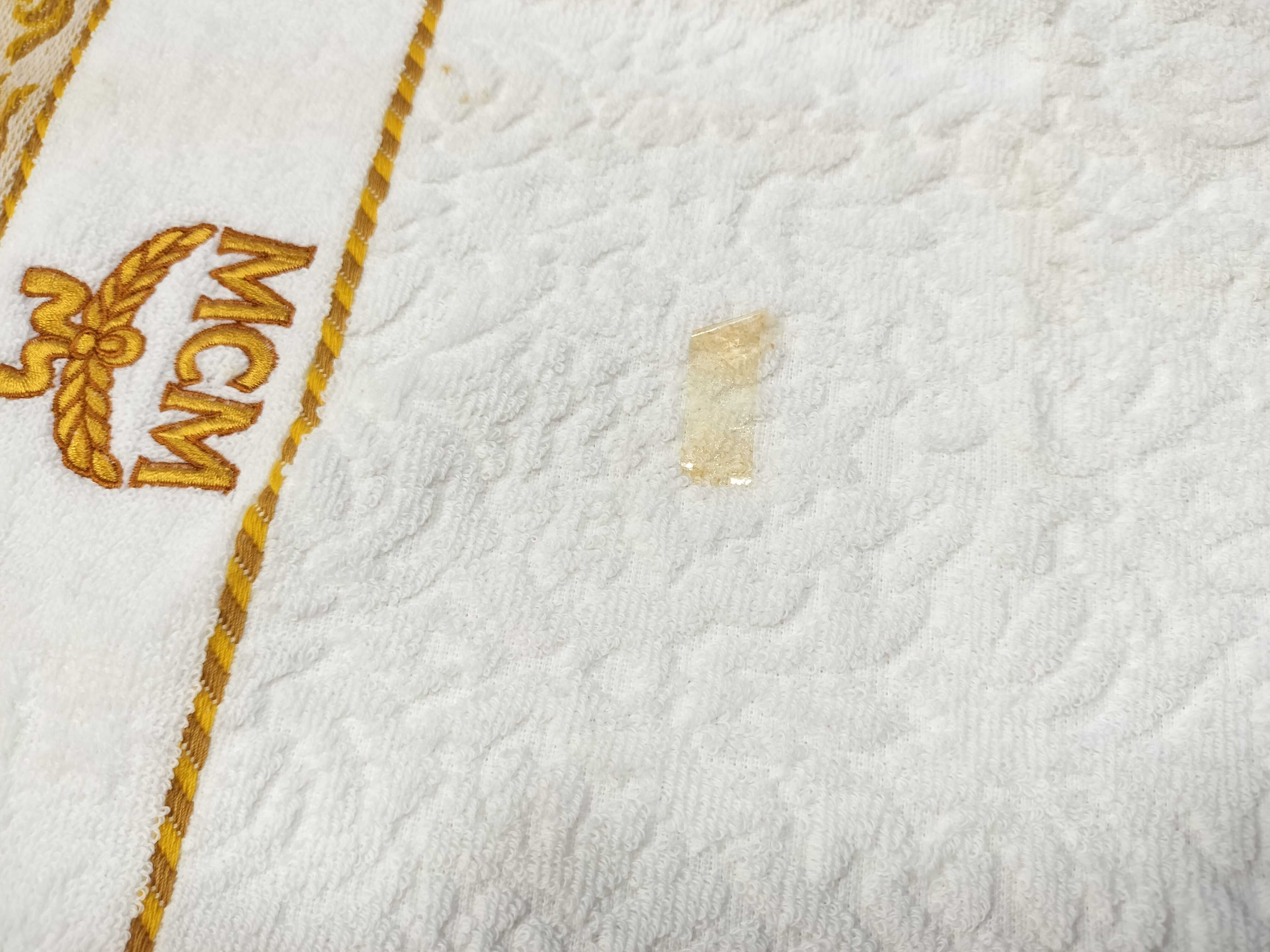 A Trio of MCM Branded Hand Towels