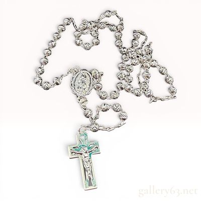 Sterling Silver Rosary Necklace. Necklace portion is 20 inches long and drop portion is 4 inches 