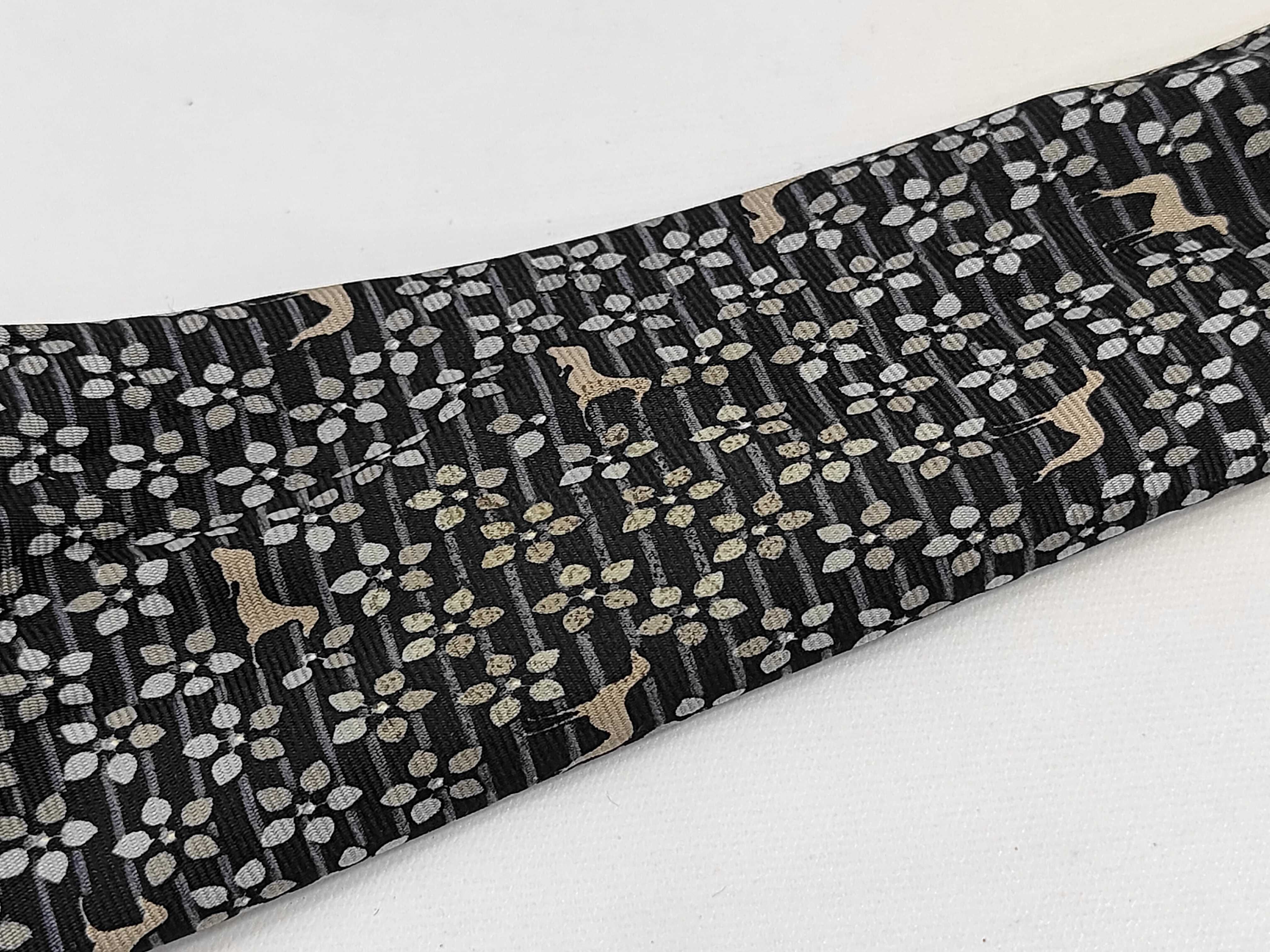A Collection of Italian Designer Silk Neckties including Fendi, Salvatore Ferragamo, Trussardi, and Hunting World