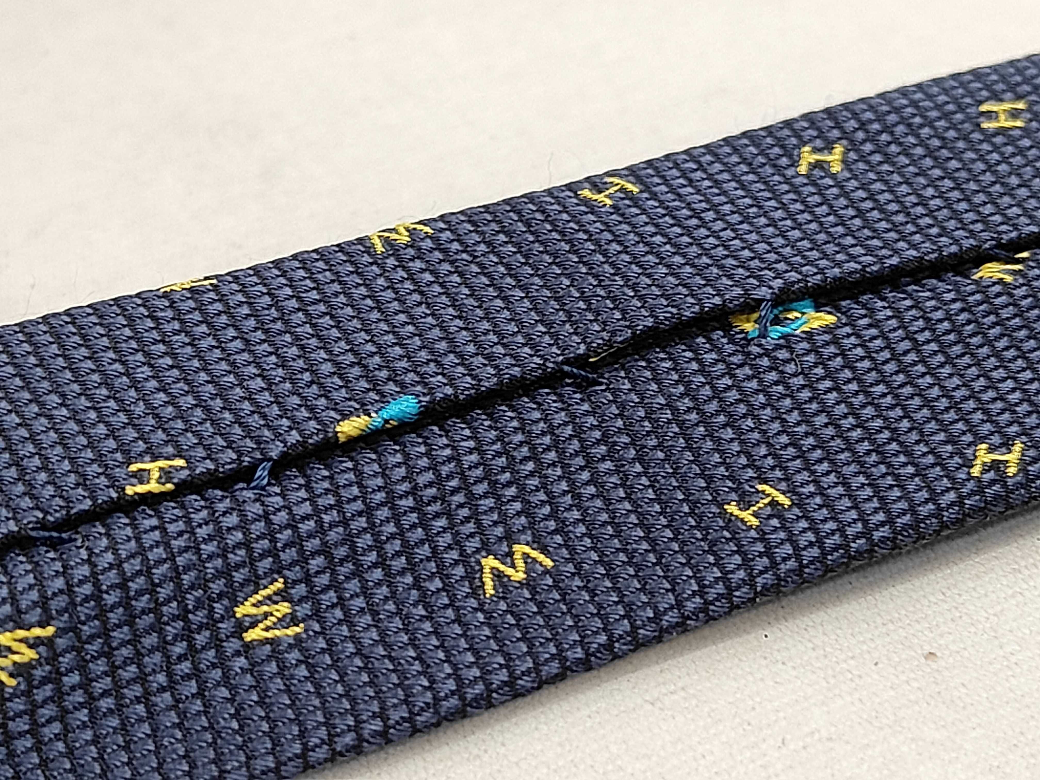 A Collection of Italian Designer Silk Neckties including Fendi, Salvatore Ferragamo, Trussardi, and Hunting World
