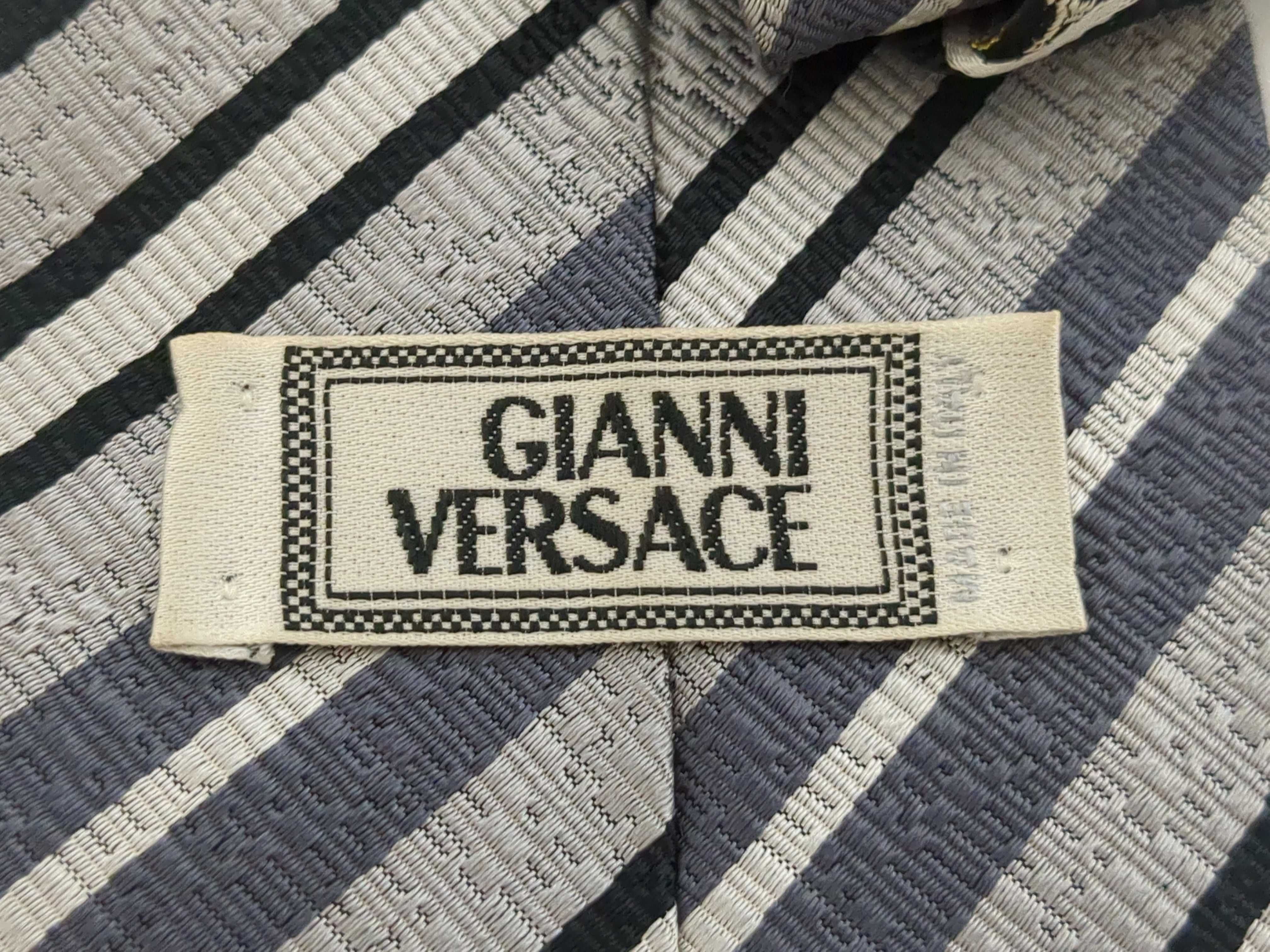 A Collection of Five Designer Silk Neckties