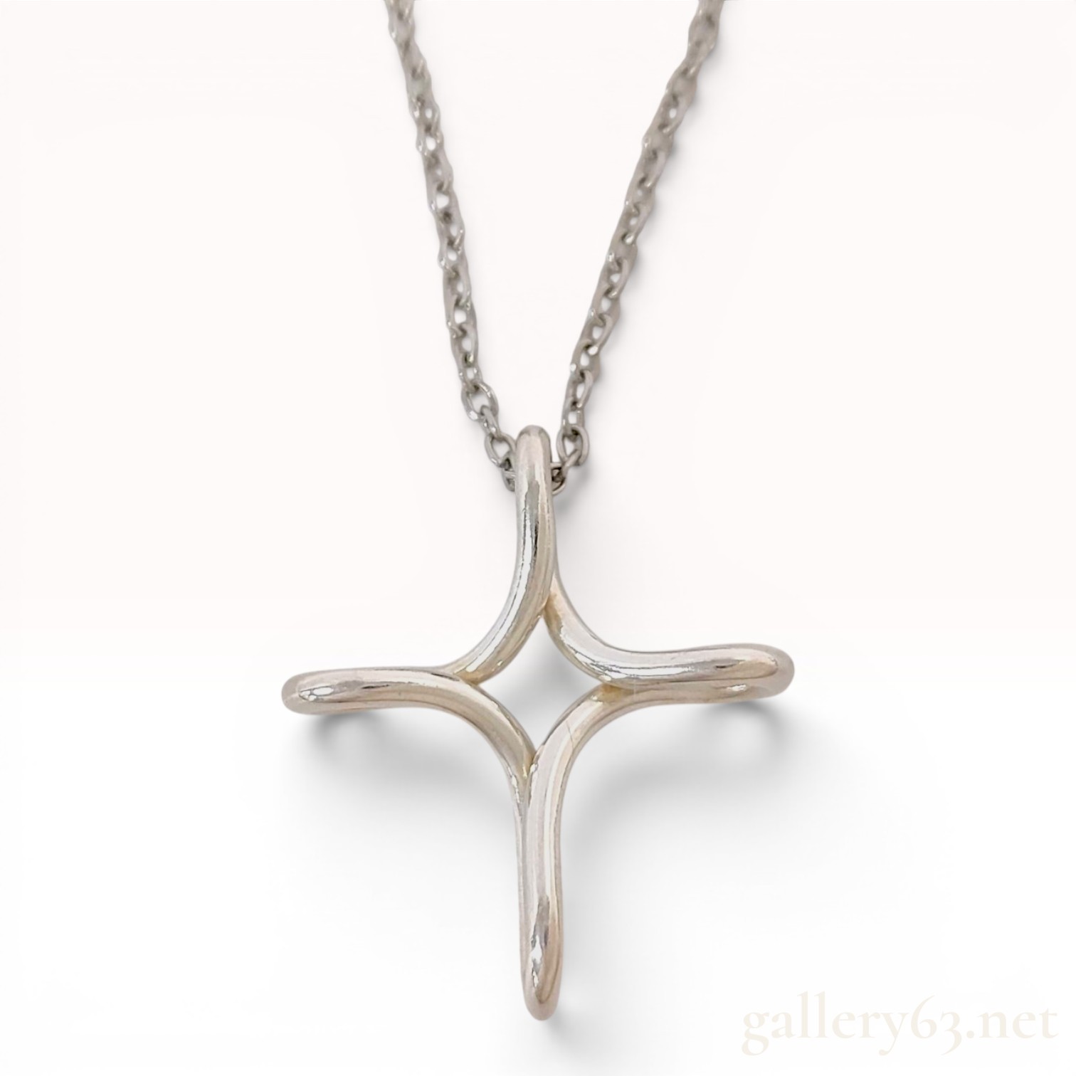 Tiffany and Co. Elsa Peretti Sterling Silver Infinity Cross Pendant Necklace