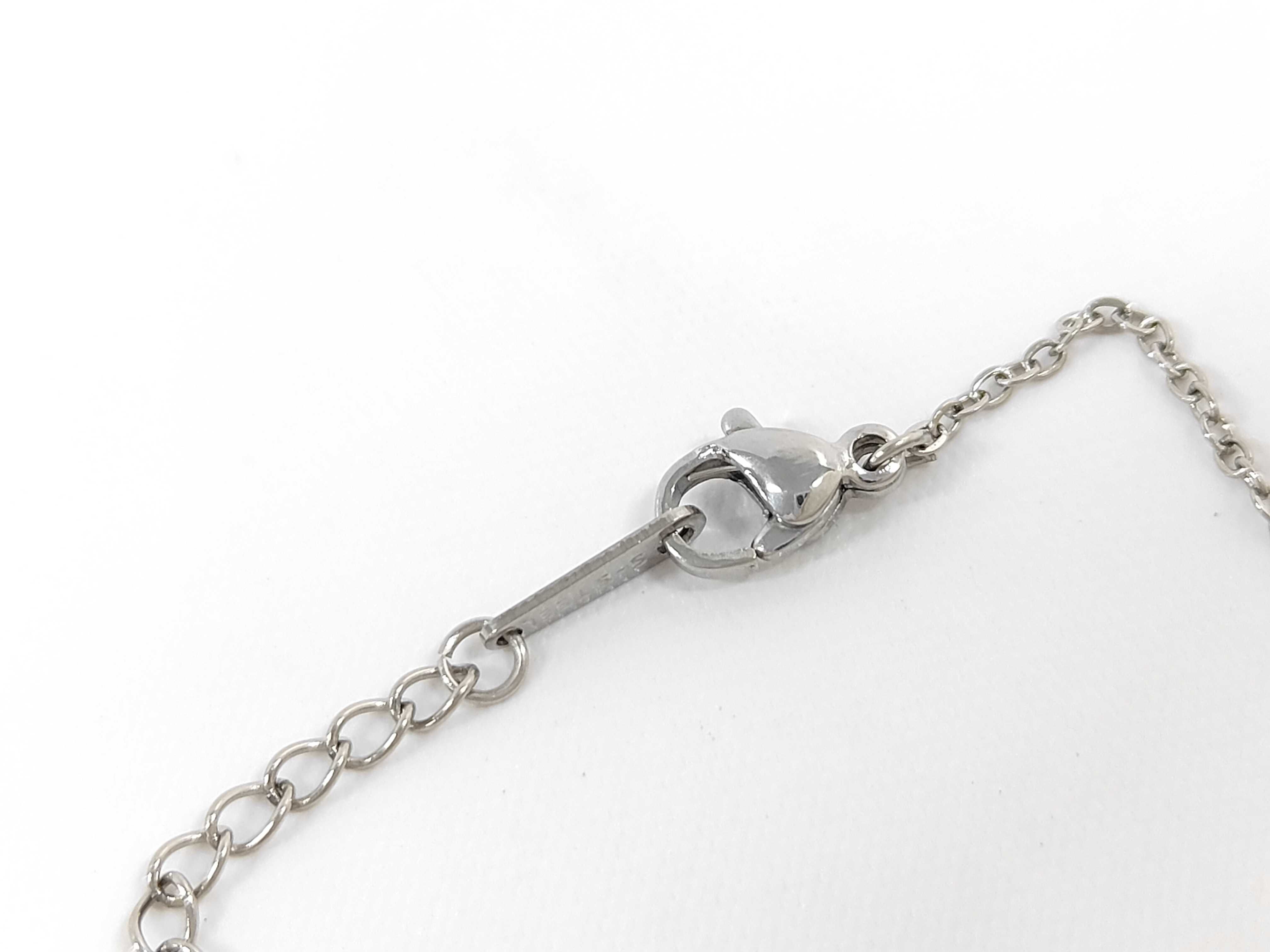 Tiffany and Co. Elsa Peretti Sterling Silver Infinity Cross Pendant Necklace