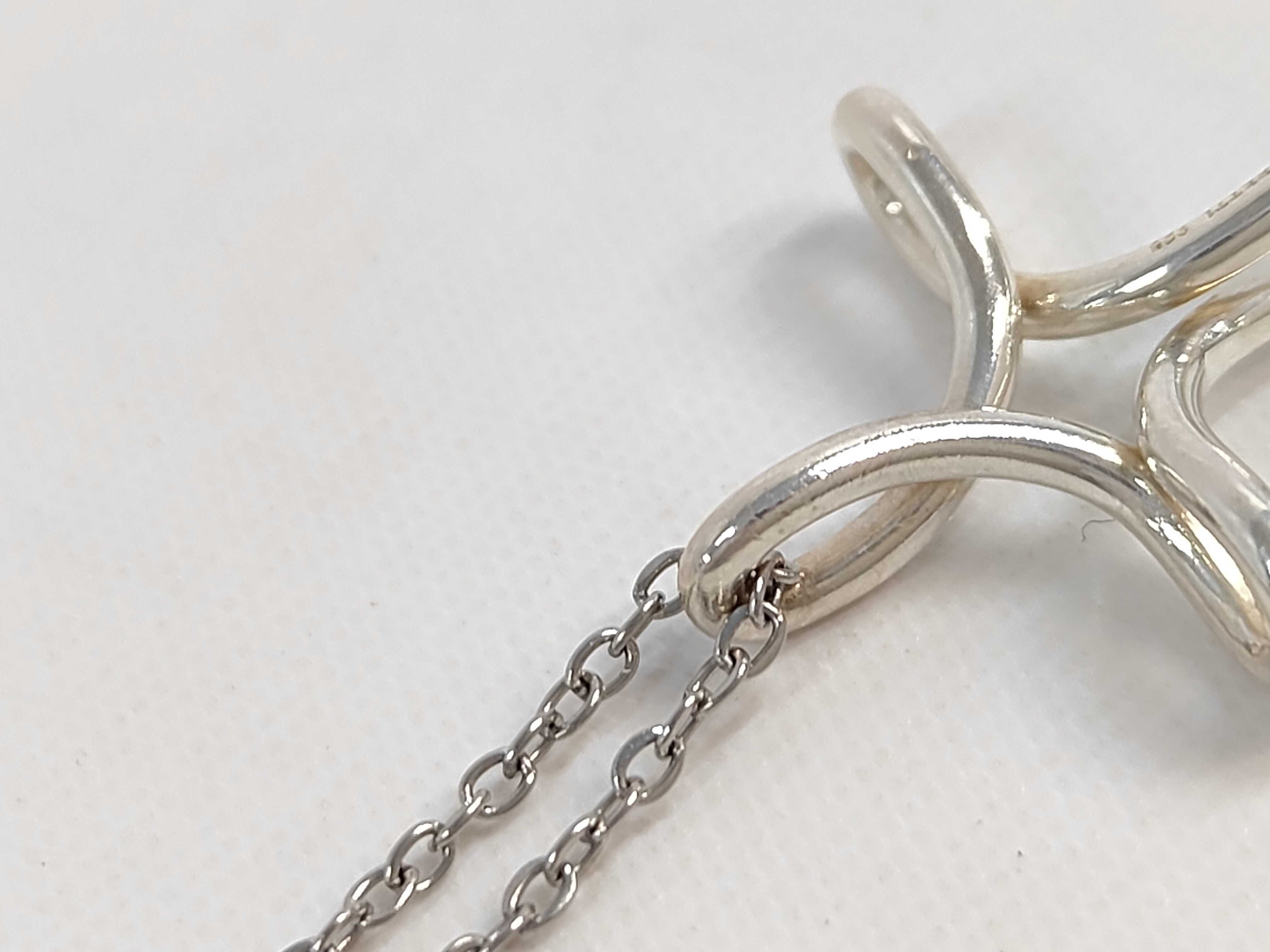 Tiffany and Co. Elsa Peretti Sterling Silver Infinity Cross Pendant Necklace