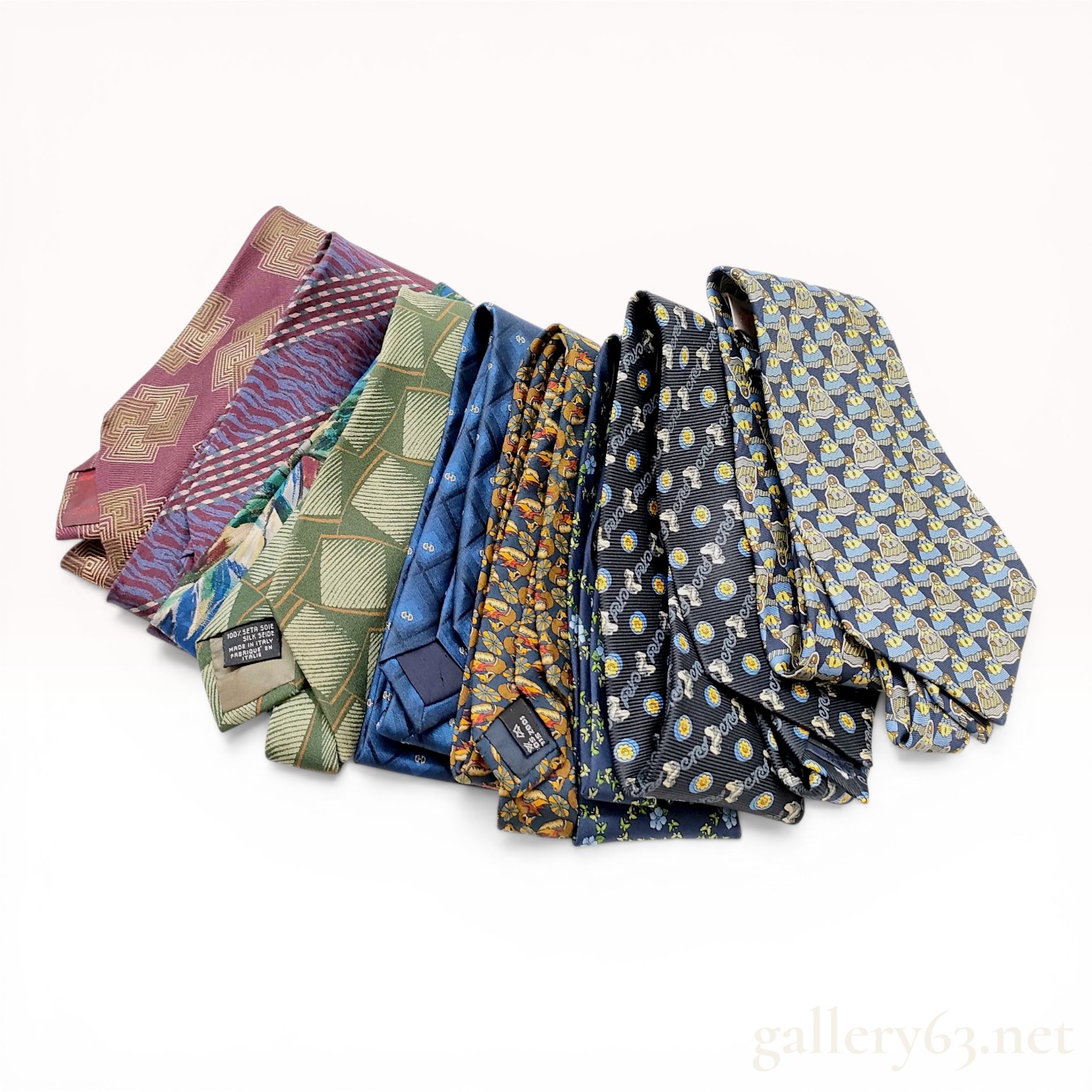 A Collection of Nine Designer Silk Neckties including Giorgio Armani, Givenchy, and Salvatore Ferragamo