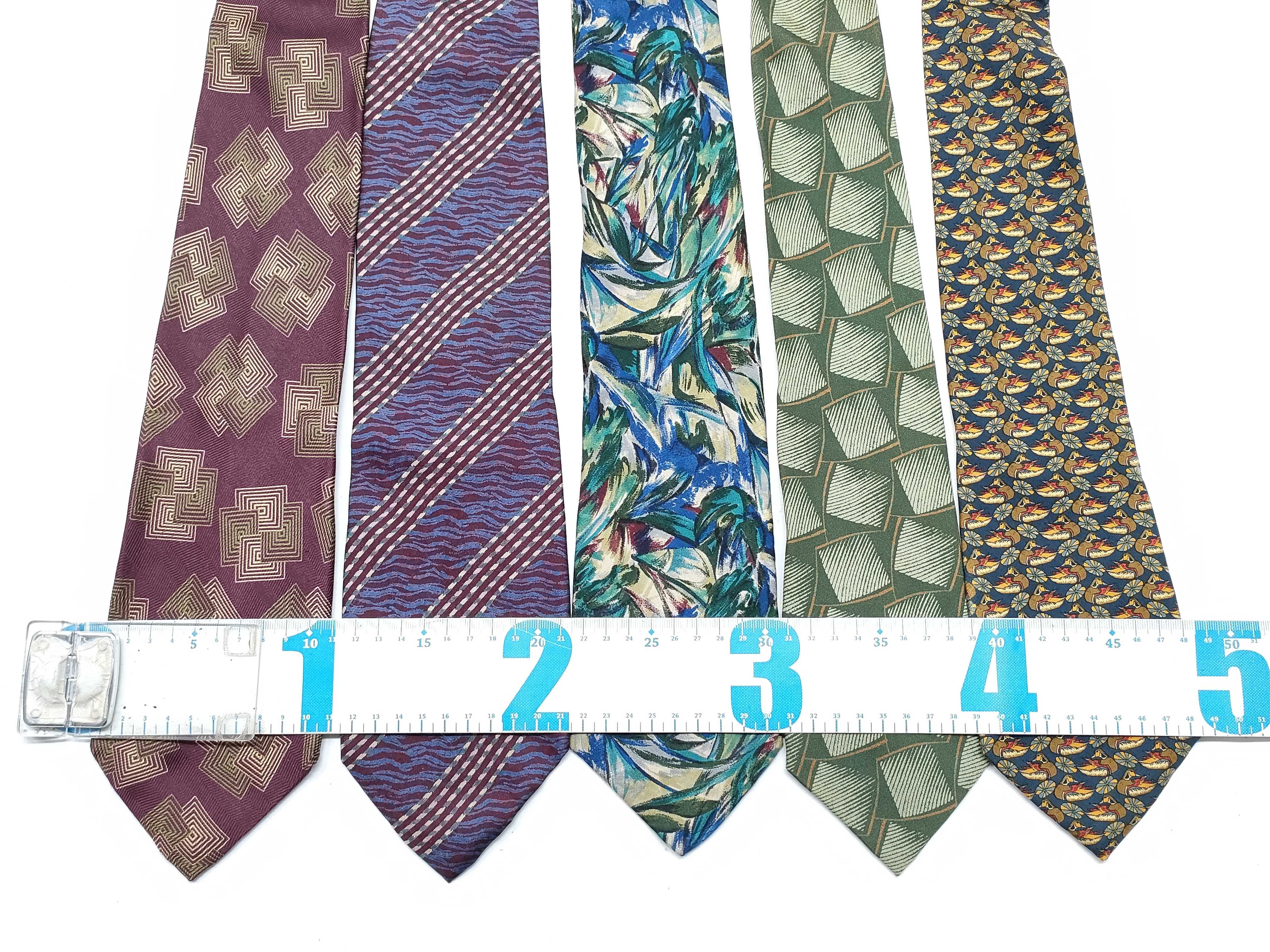 A Collection of Nine Designer Silk Neckties including Giorgio Armani, Givenchy, and Salvatore Ferragamo