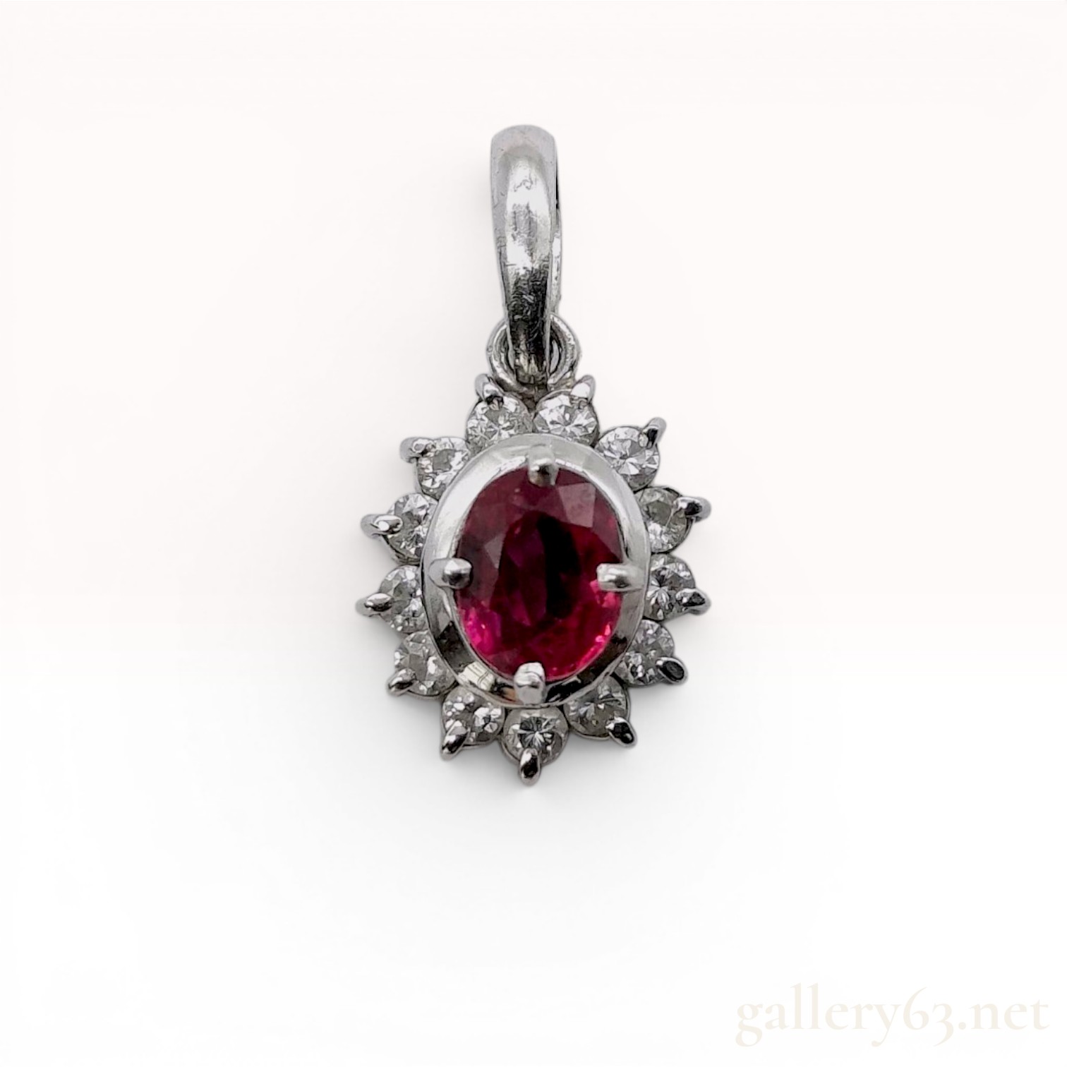 Platinum .47ct Ruby and .182ctw Diamond Halo Pendant