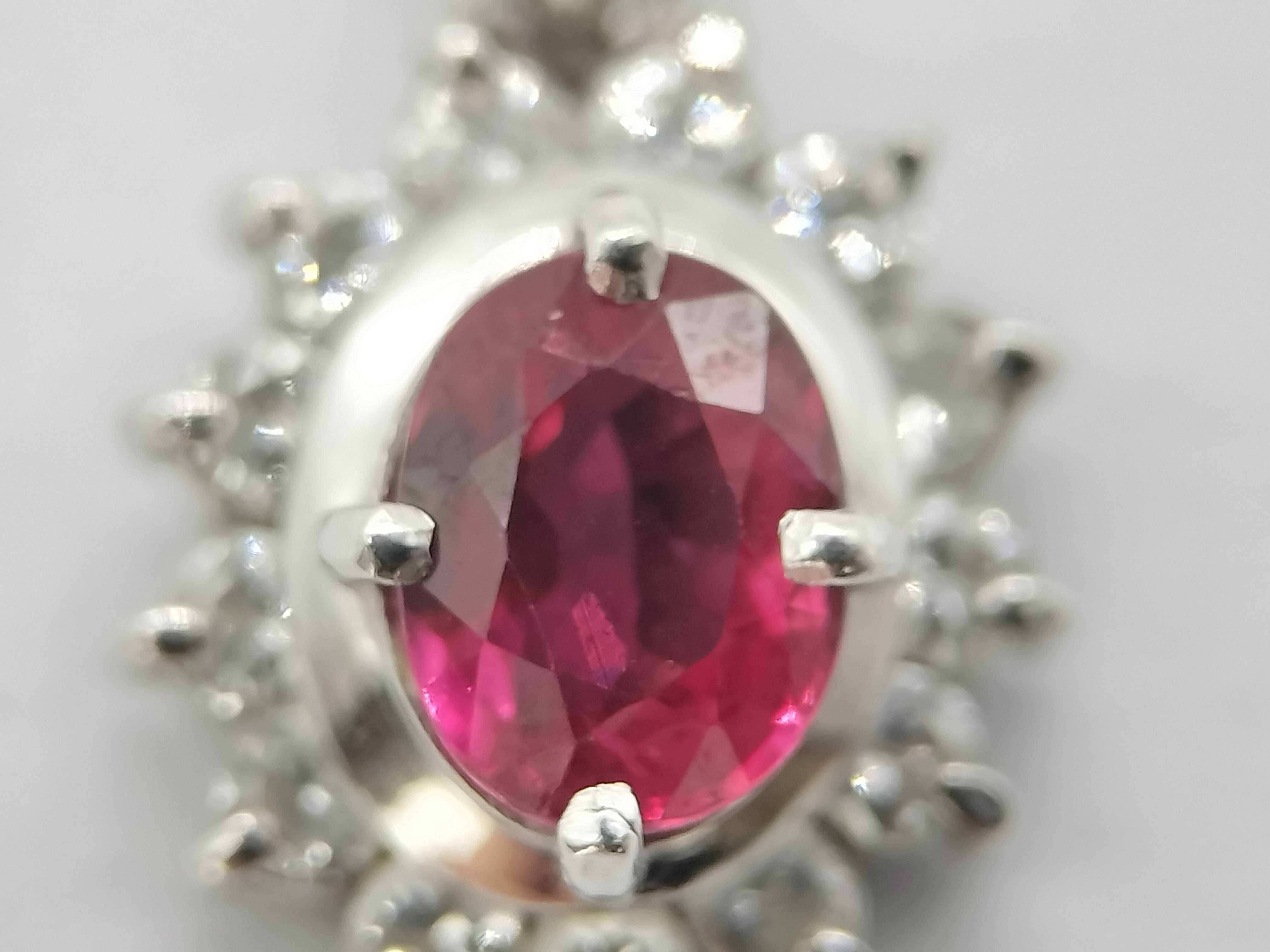 Platinum .47ct Ruby and .182ctw Diamond Halo Pendant