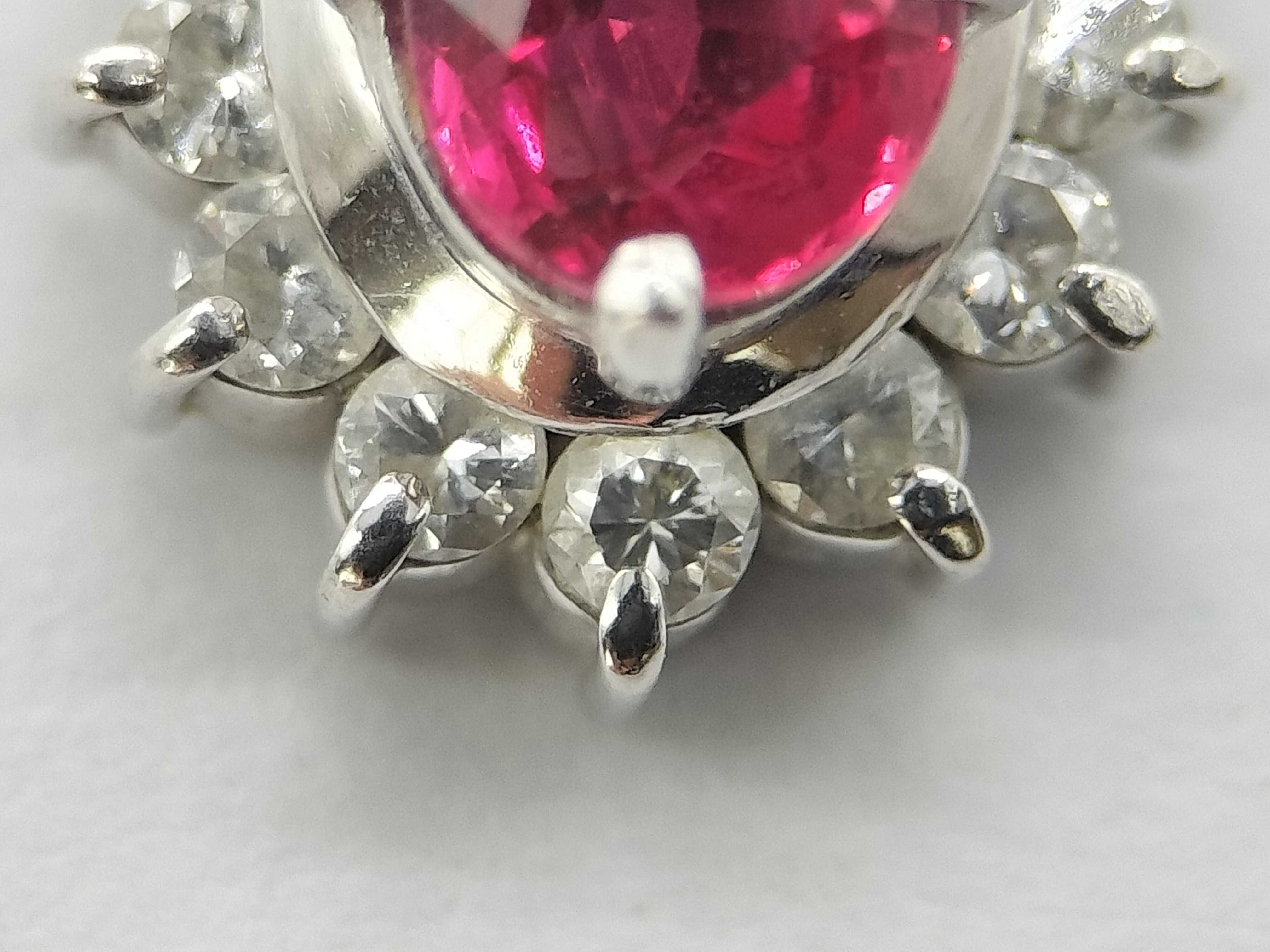 Platinum .47ct Ruby and .182ctw Diamond Halo Pendant