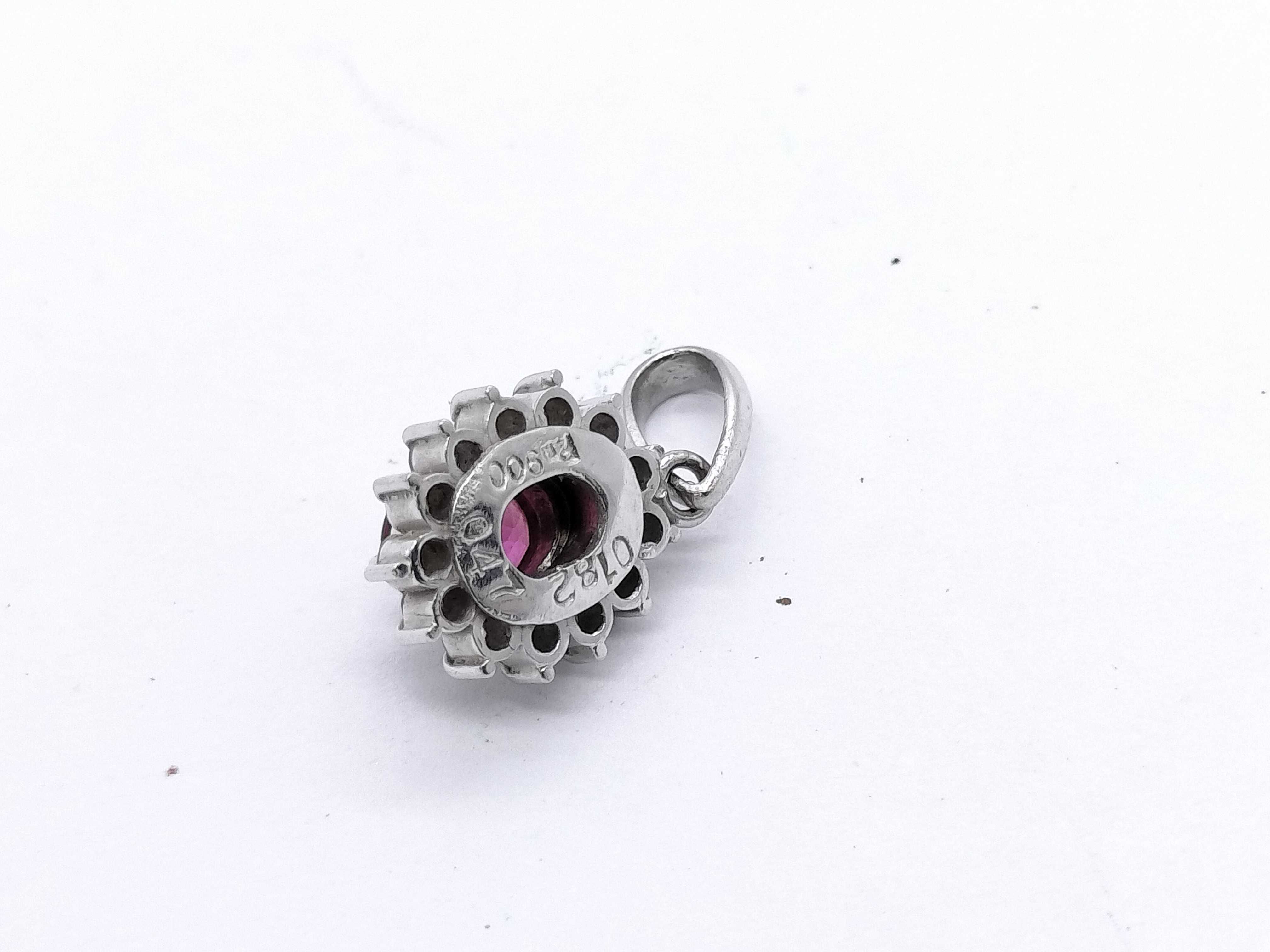 Platinum .47ct Ruby and .182ctw Diamond Halo Pendant