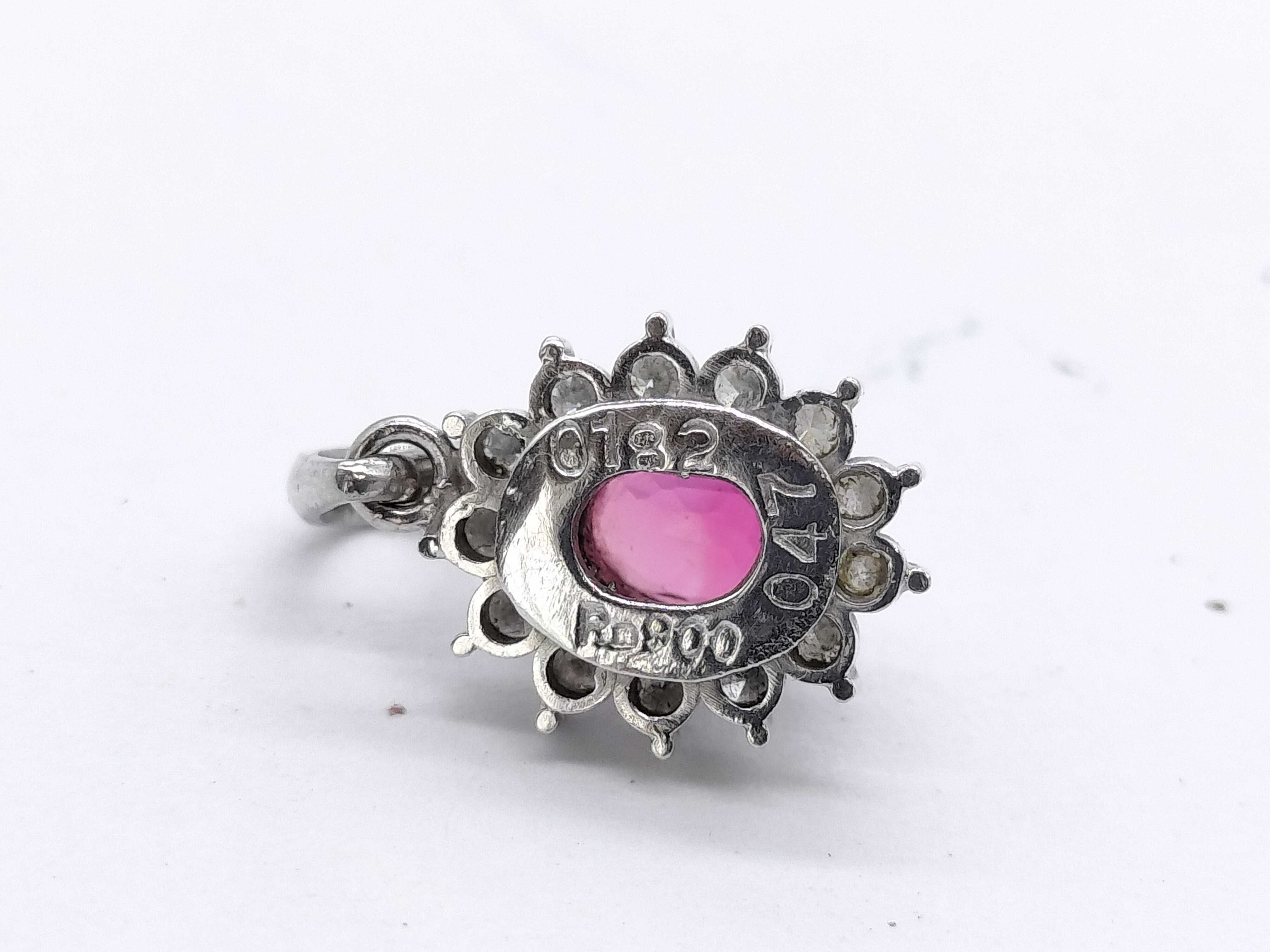 Platinum .47ct Ruby and .182ctw Diamond Halo Pendant