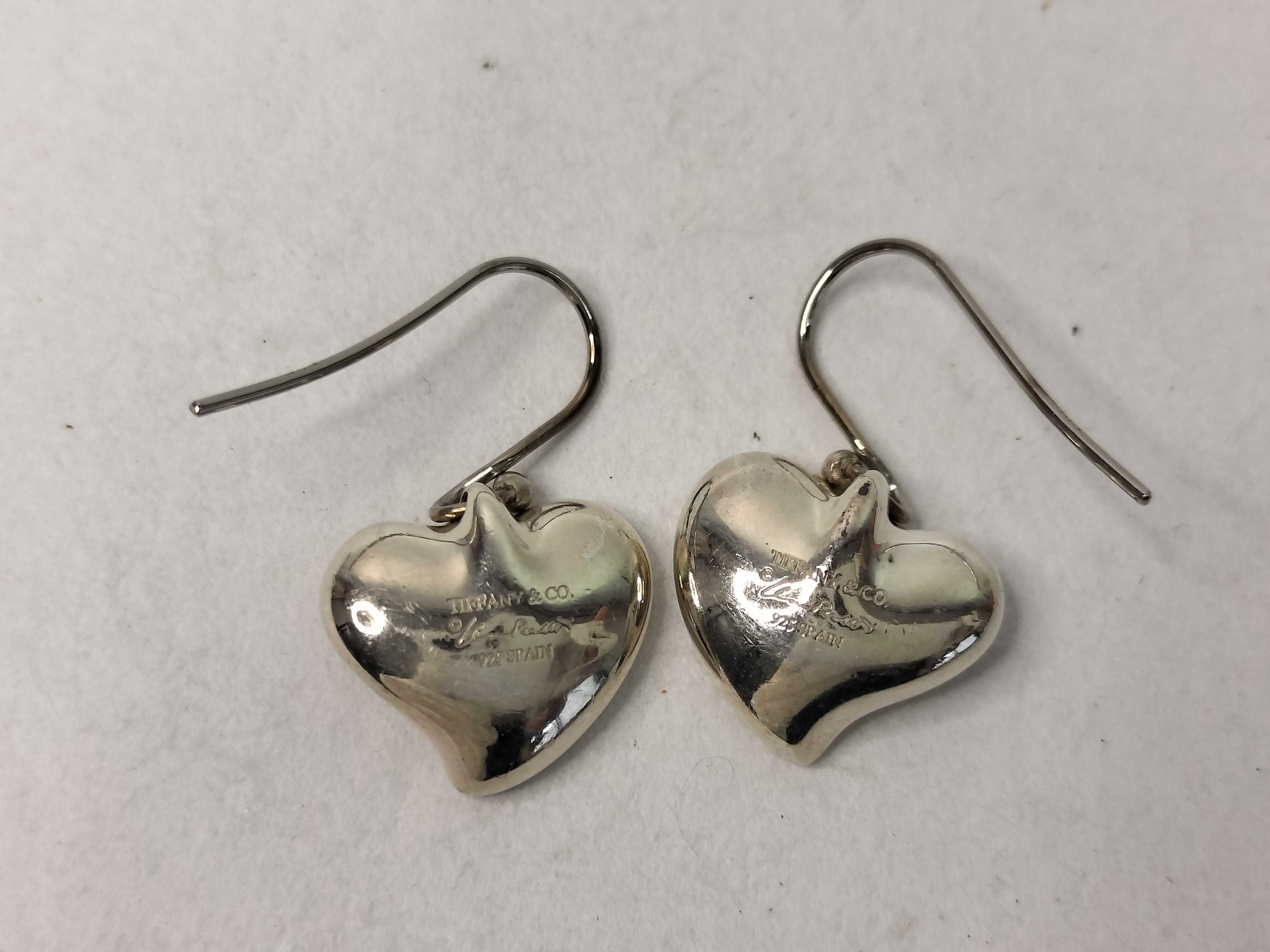 A Pair of Tiffany and Co. Elsa Peretti Sterling Silver Full Heart Drop Earrings