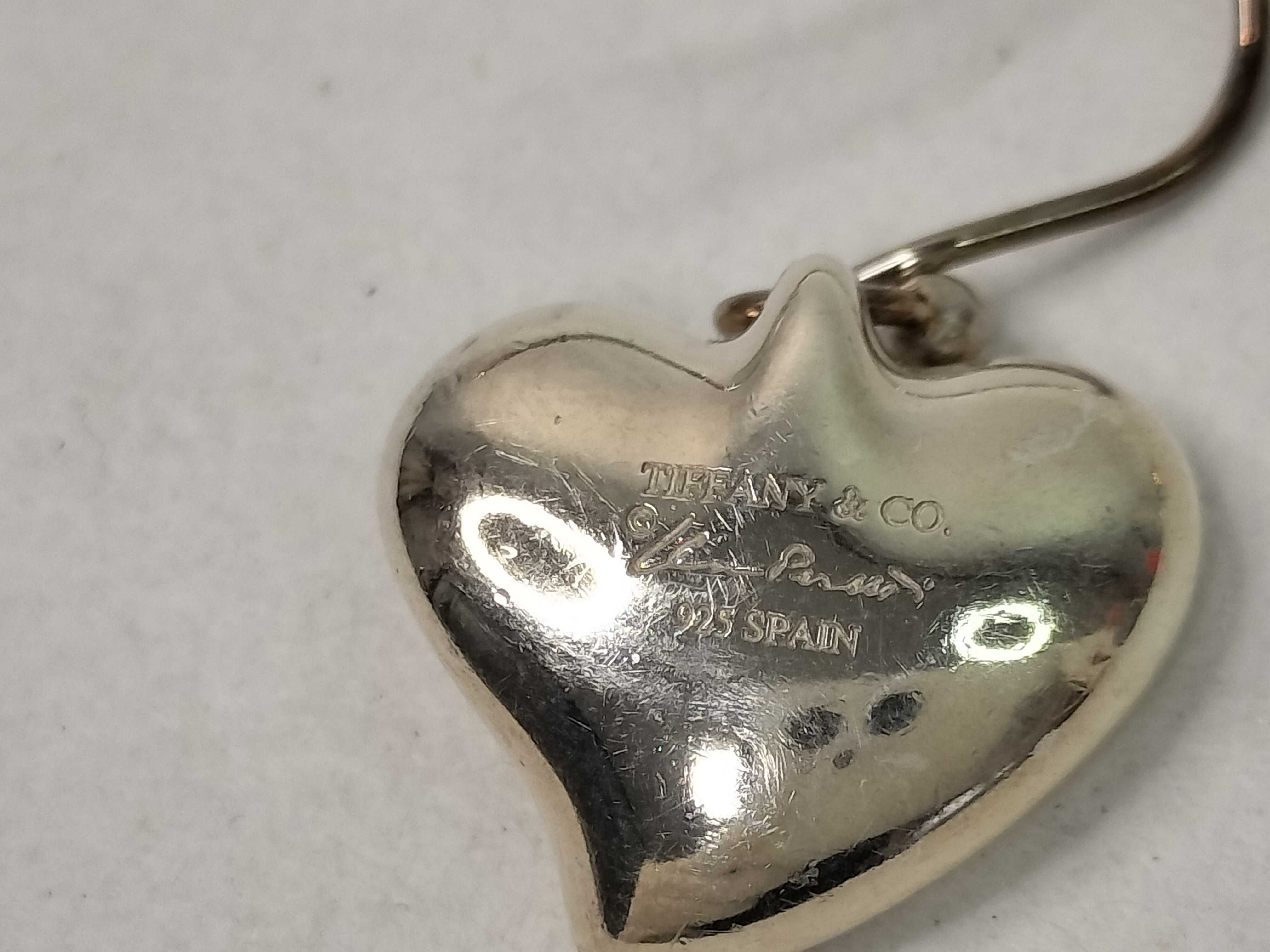A Pair of Tiffany and Co. Elsa Peretti Sterling Silver Full Heart Drop Earrings
