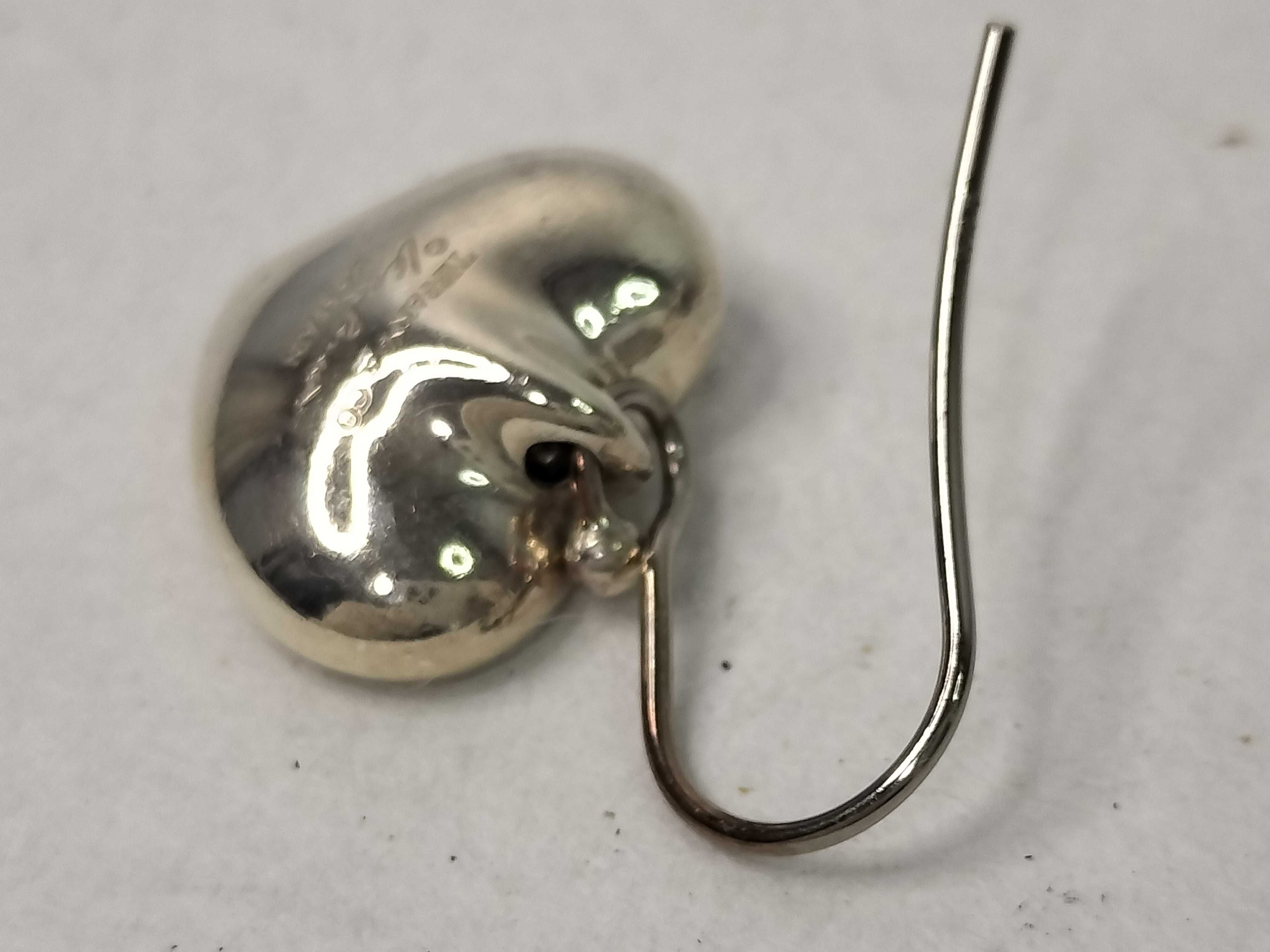 A Pair of Tiffany and Co. Elsa Peretti Sterling Silver Full Heart Drop Earrings
