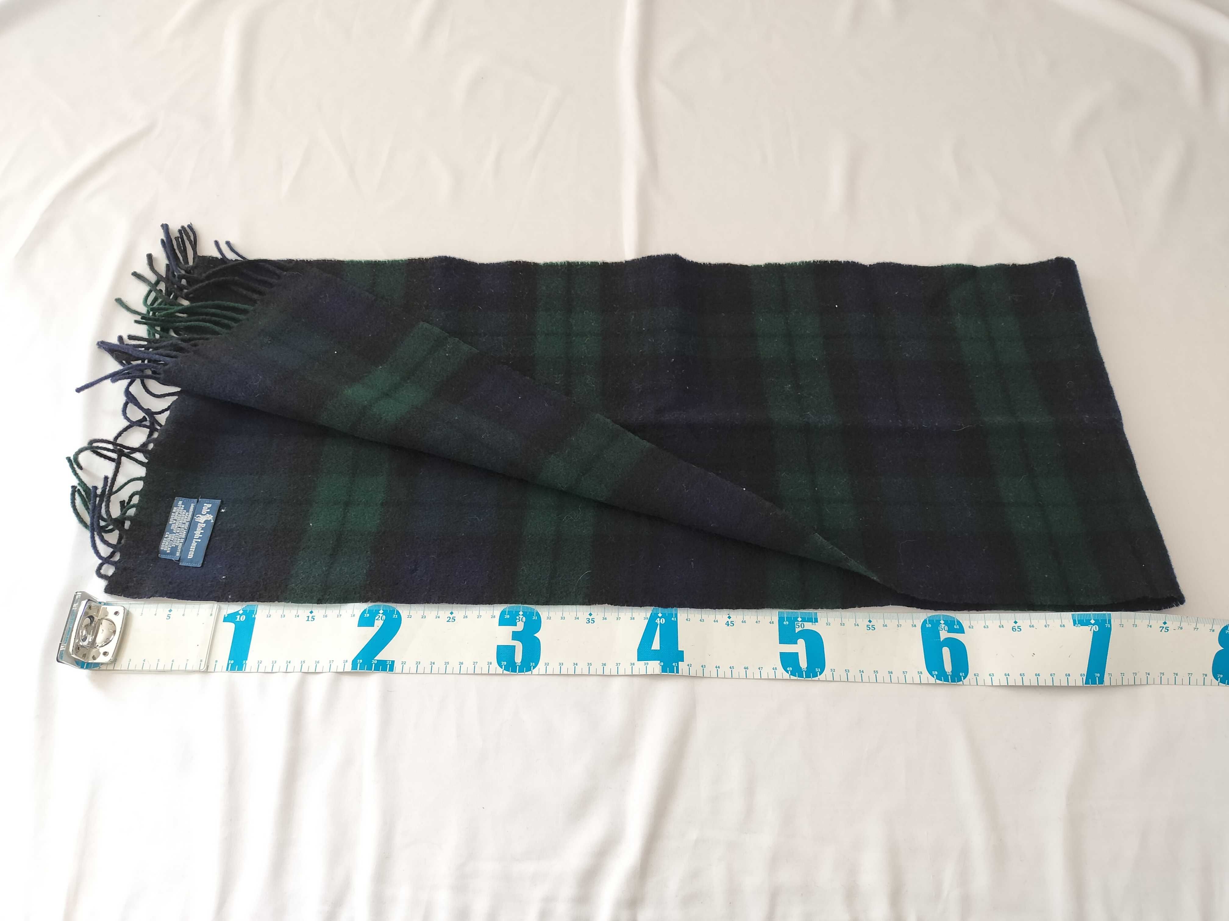 A Group of Four Designer Silk and Wool Scarves and Wraps