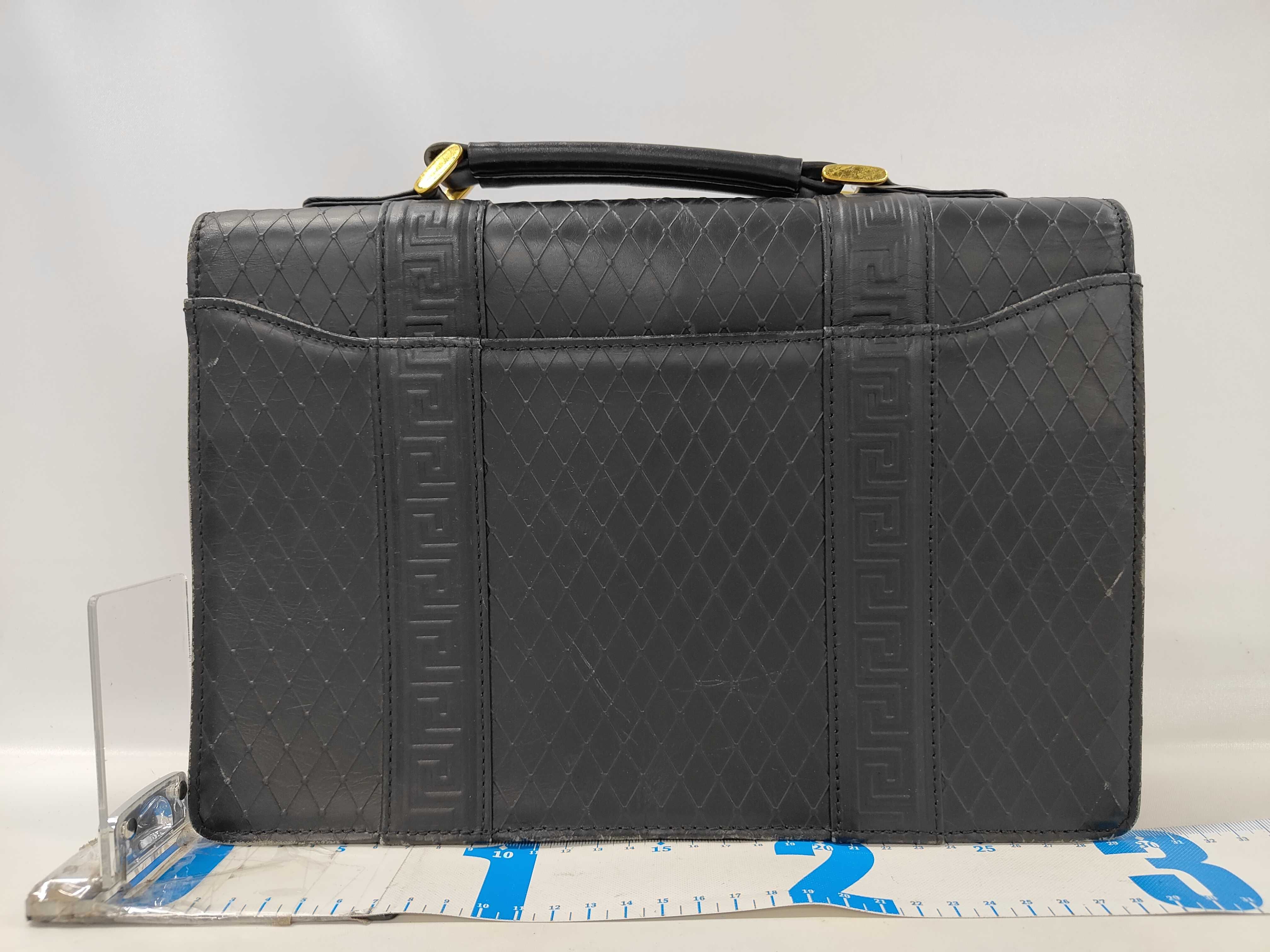 Gianni Versace Vintage Sunburst Embossed Leather Briefcase