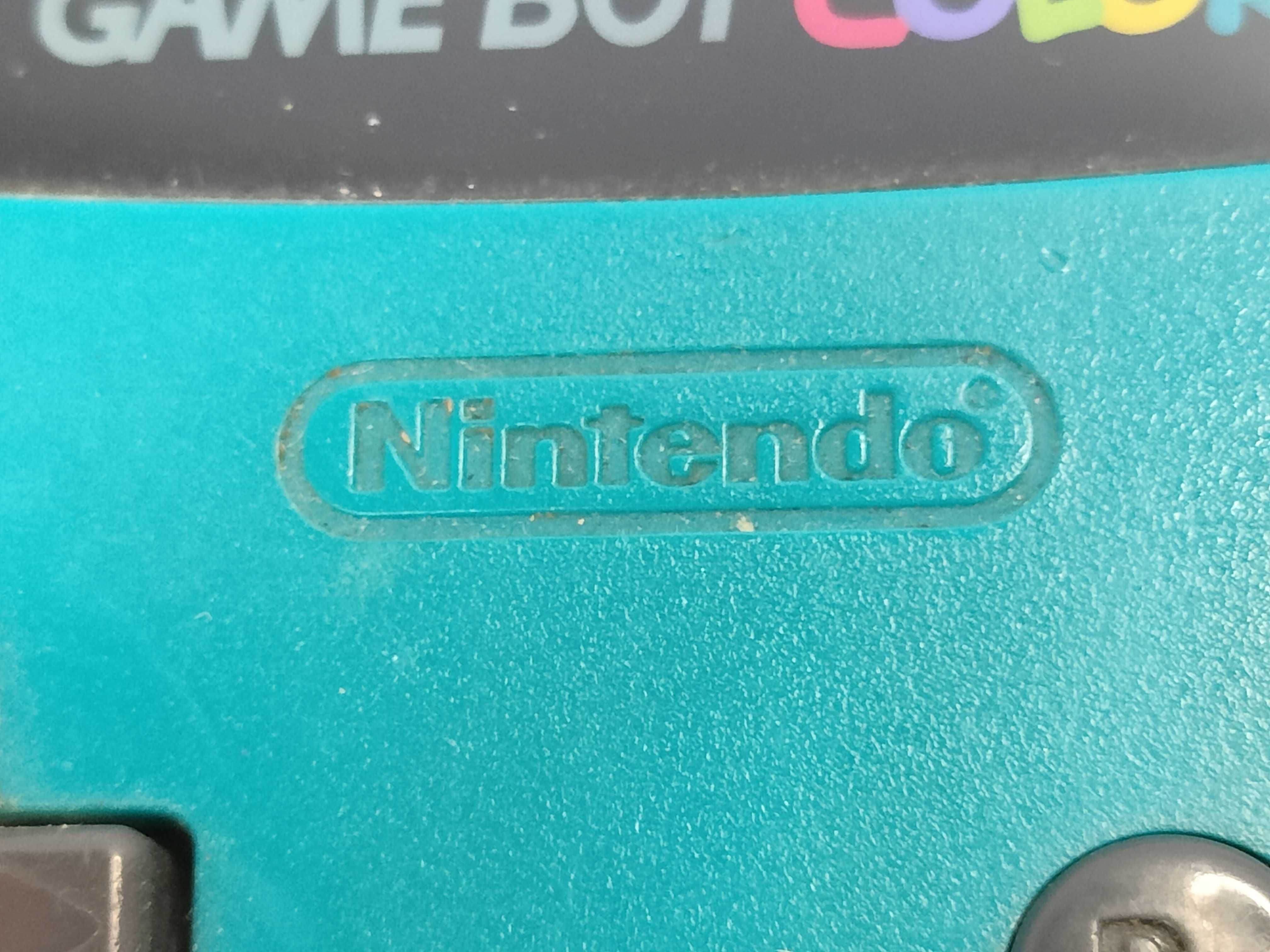 Three Nintendo Handheld Consoles, Two Game Boy Color Teal CGB-001 and One Game Boy Advance Glacier AGB-001