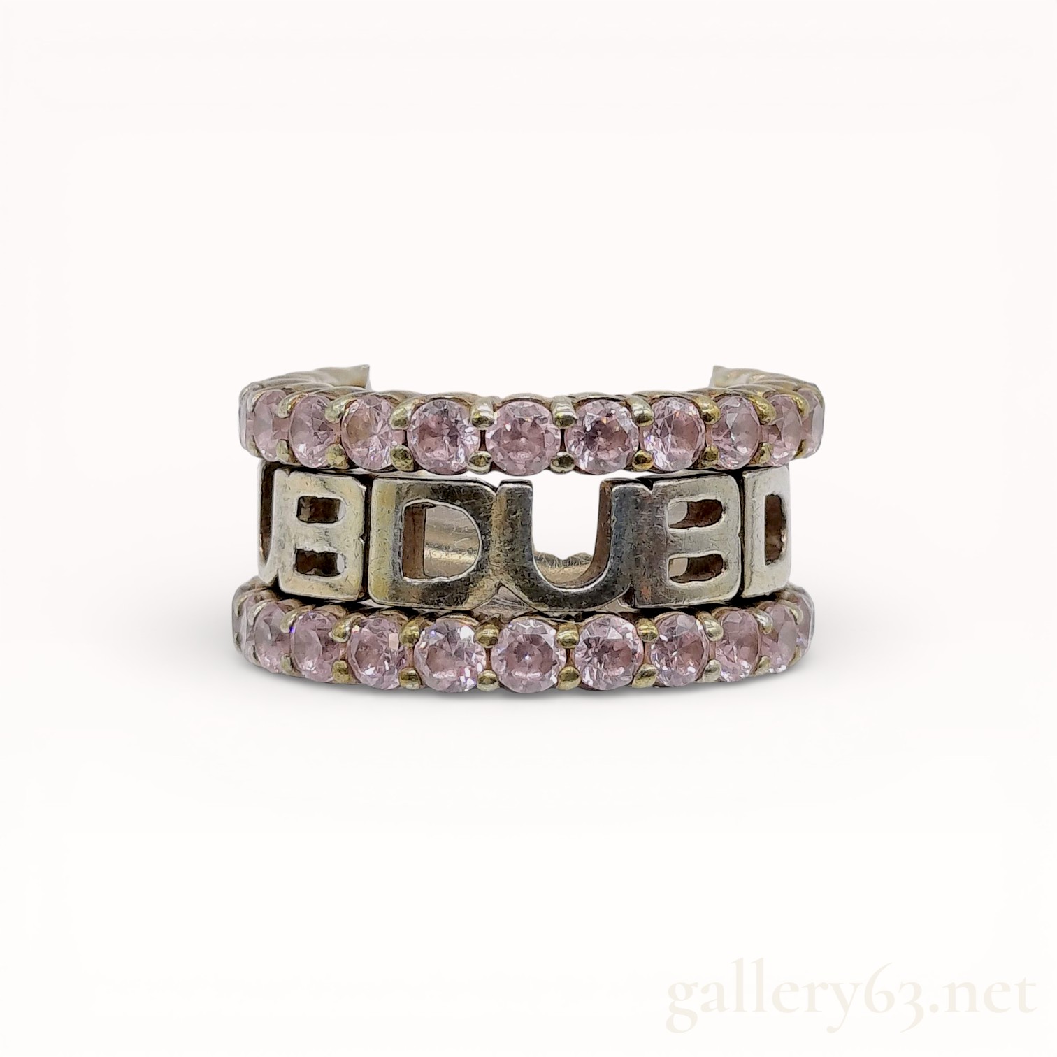 A Trio of DUB Collection Sterling Silver and Pink Stone Stackable Rings