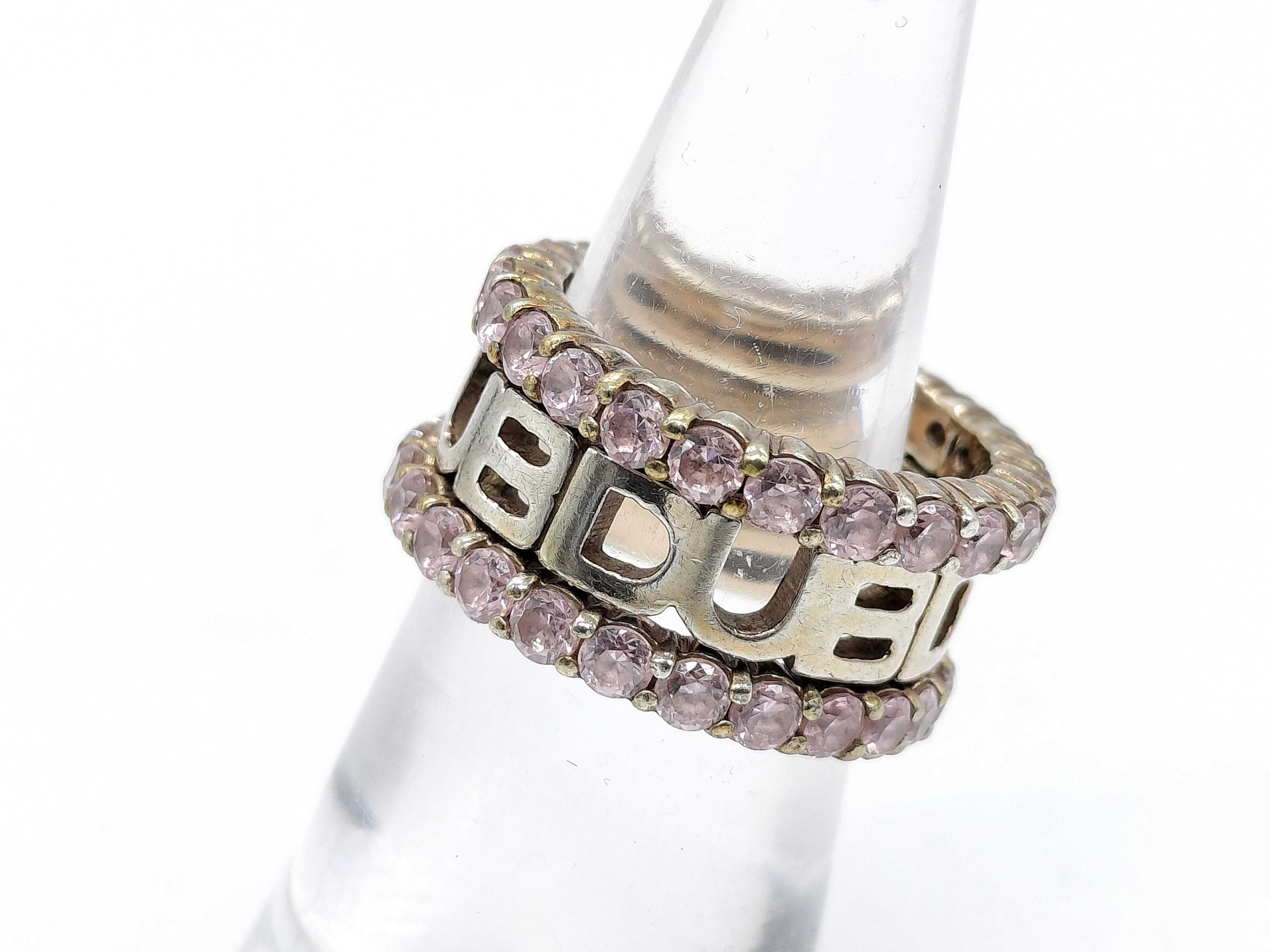 A Trio of DUB Collection Sterling Silver and Pink Stone Stackable Rings