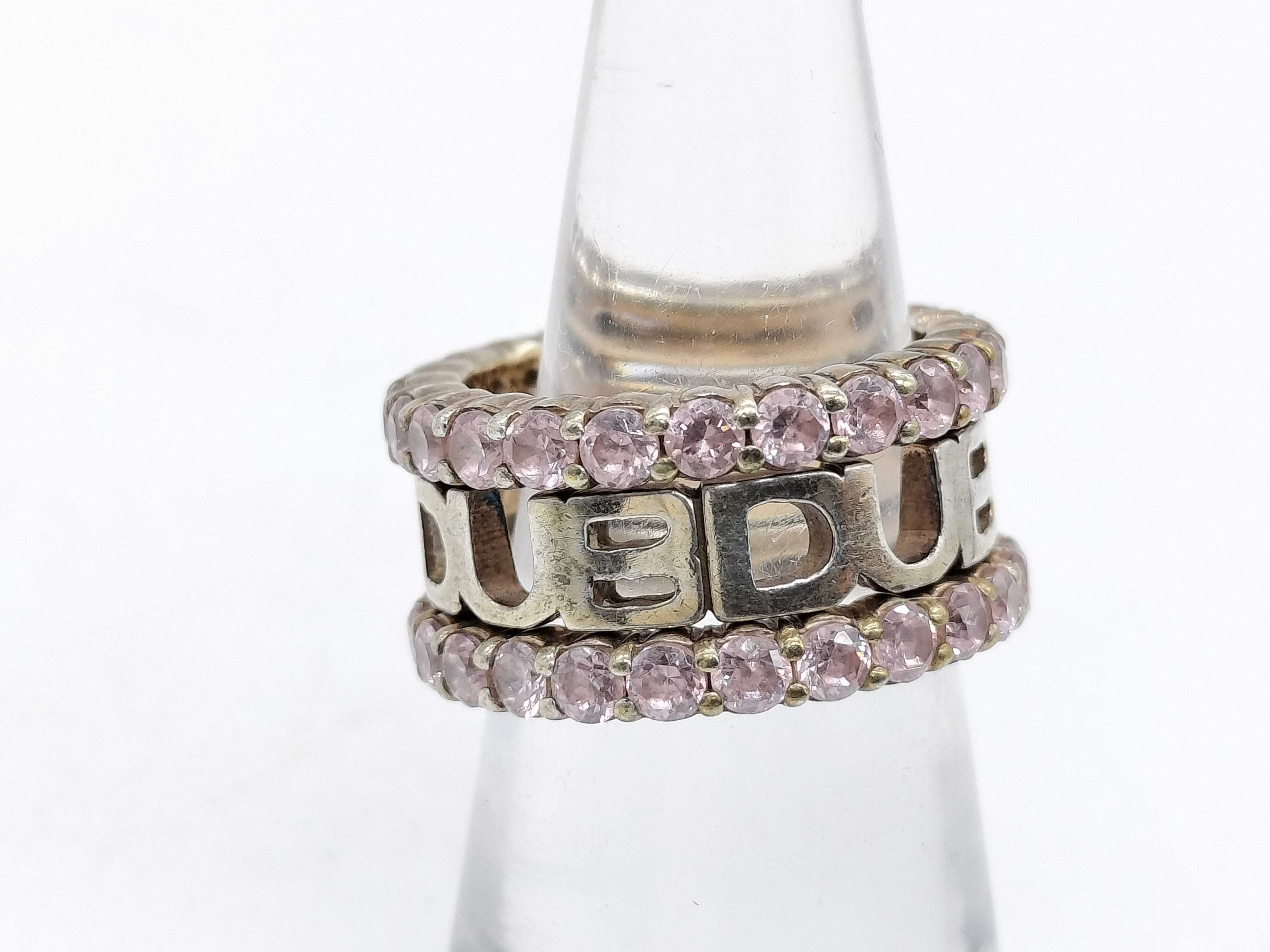 A Trio of DUB Collection Sterling Silver and Pink Stone Stackable Rings