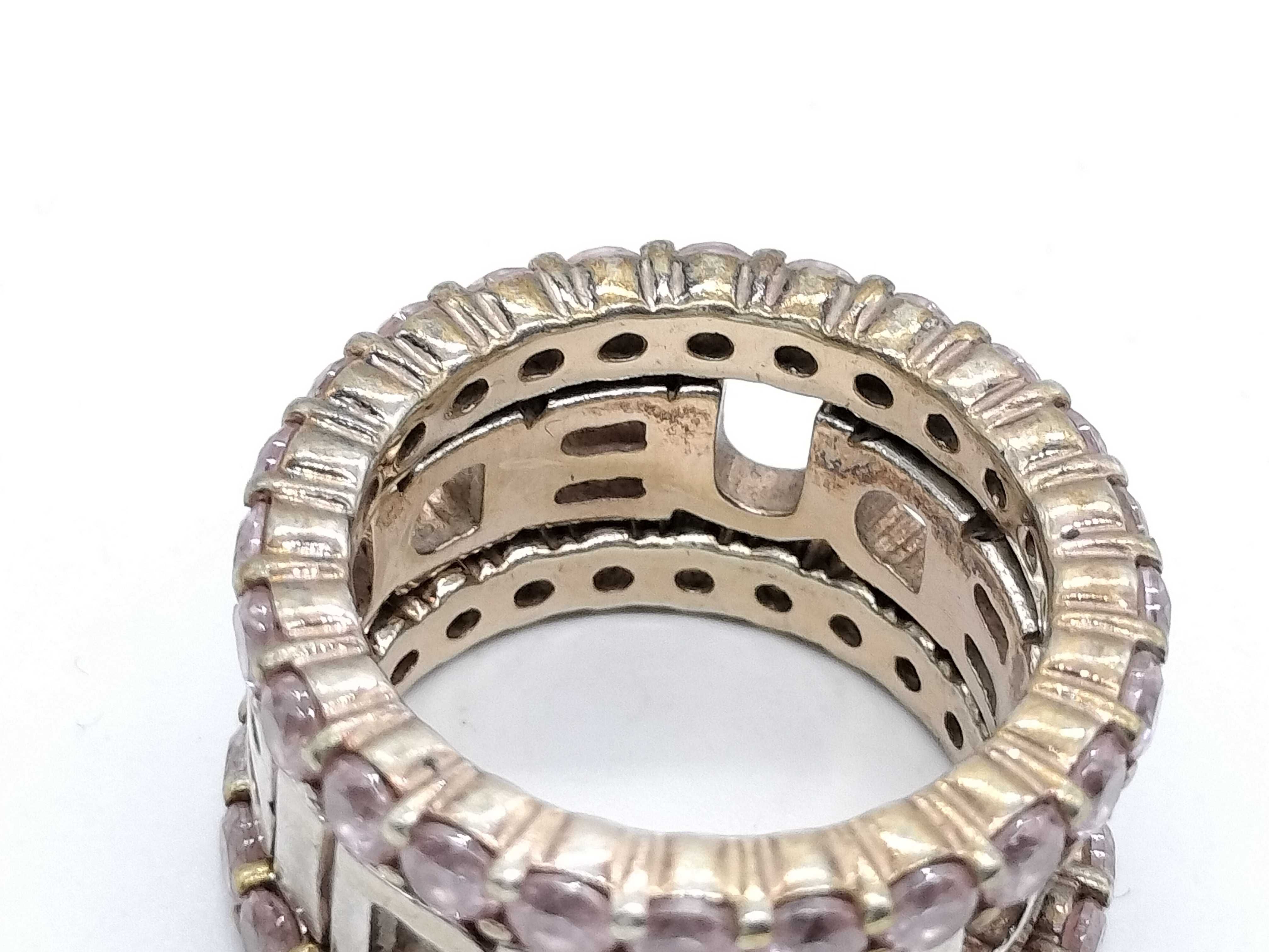 A Trio of DUB Collection Sterling Silver and Pink Stone Stackable Rings