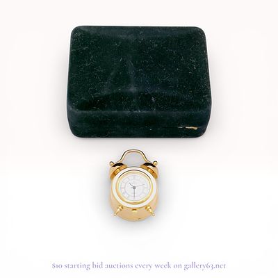 Vexcel Miniature Gold-Tone Quartz Twin-Bell Style Desk Clock, Late 20th Century. A miniature 