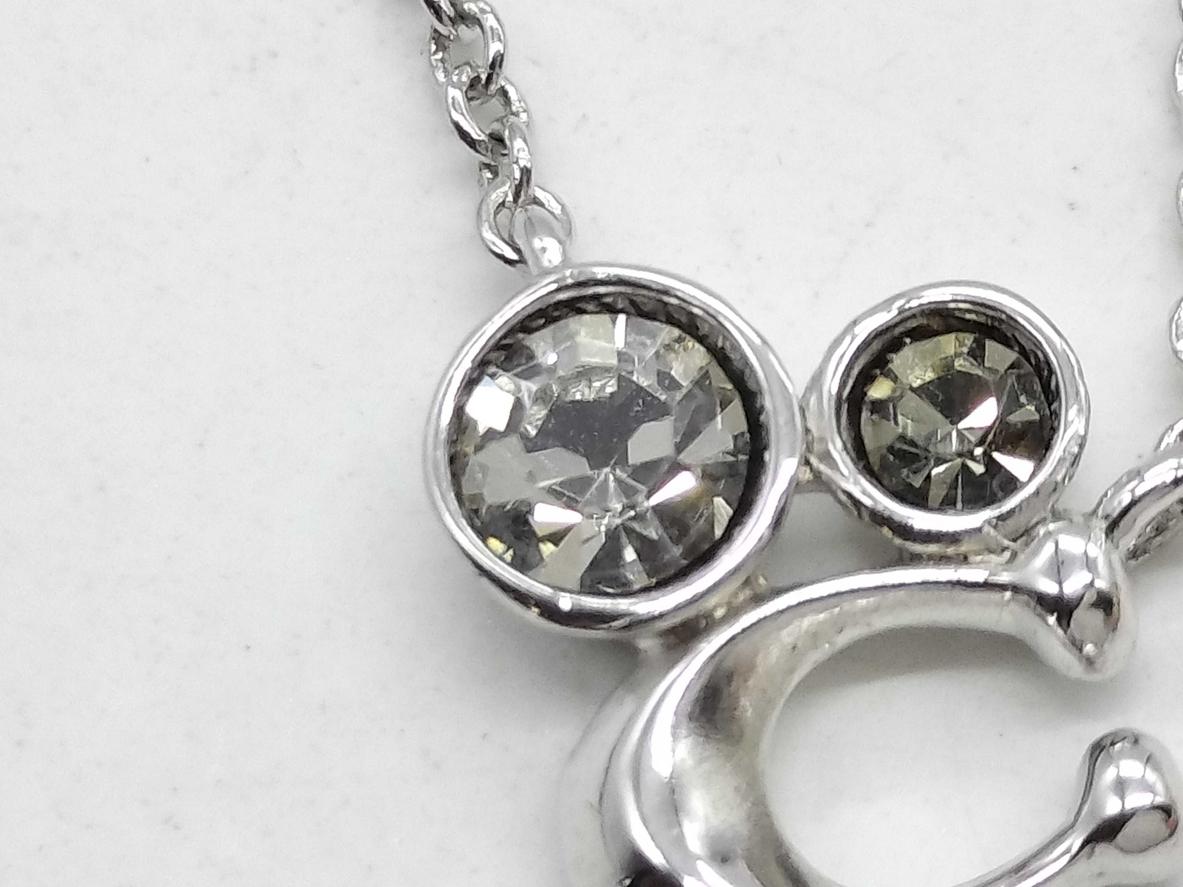 Silver and Gold-Tone Coach Jewelry Collection, Pendant Necklaces and Stud Earrings, Logo and Character Motifs