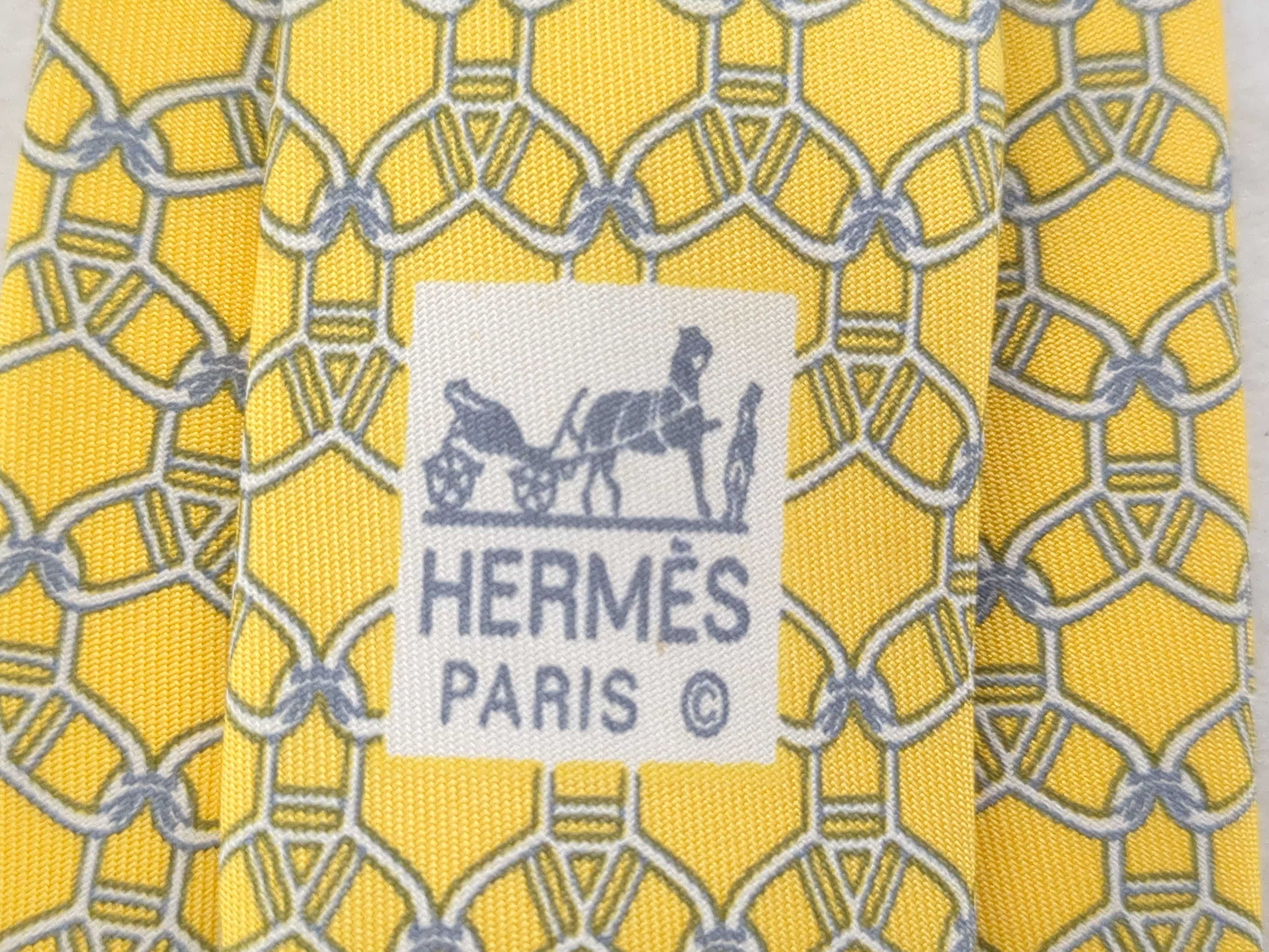 An Assortment of Men's Silk Designer Neckties Including Hermes and Chanel