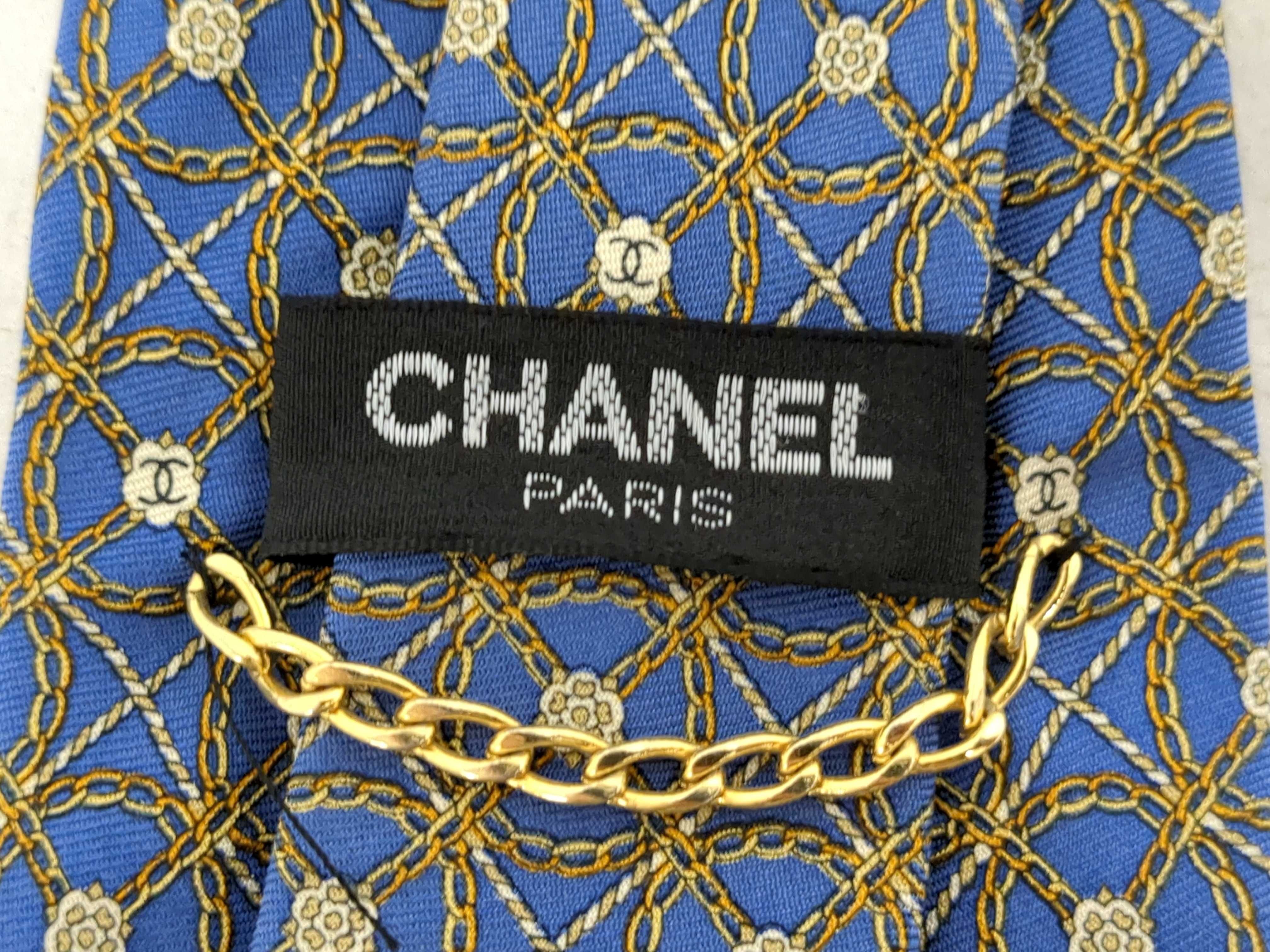 An Assortment of Men's Silk Designer Neckties Including Hermes and Chanel