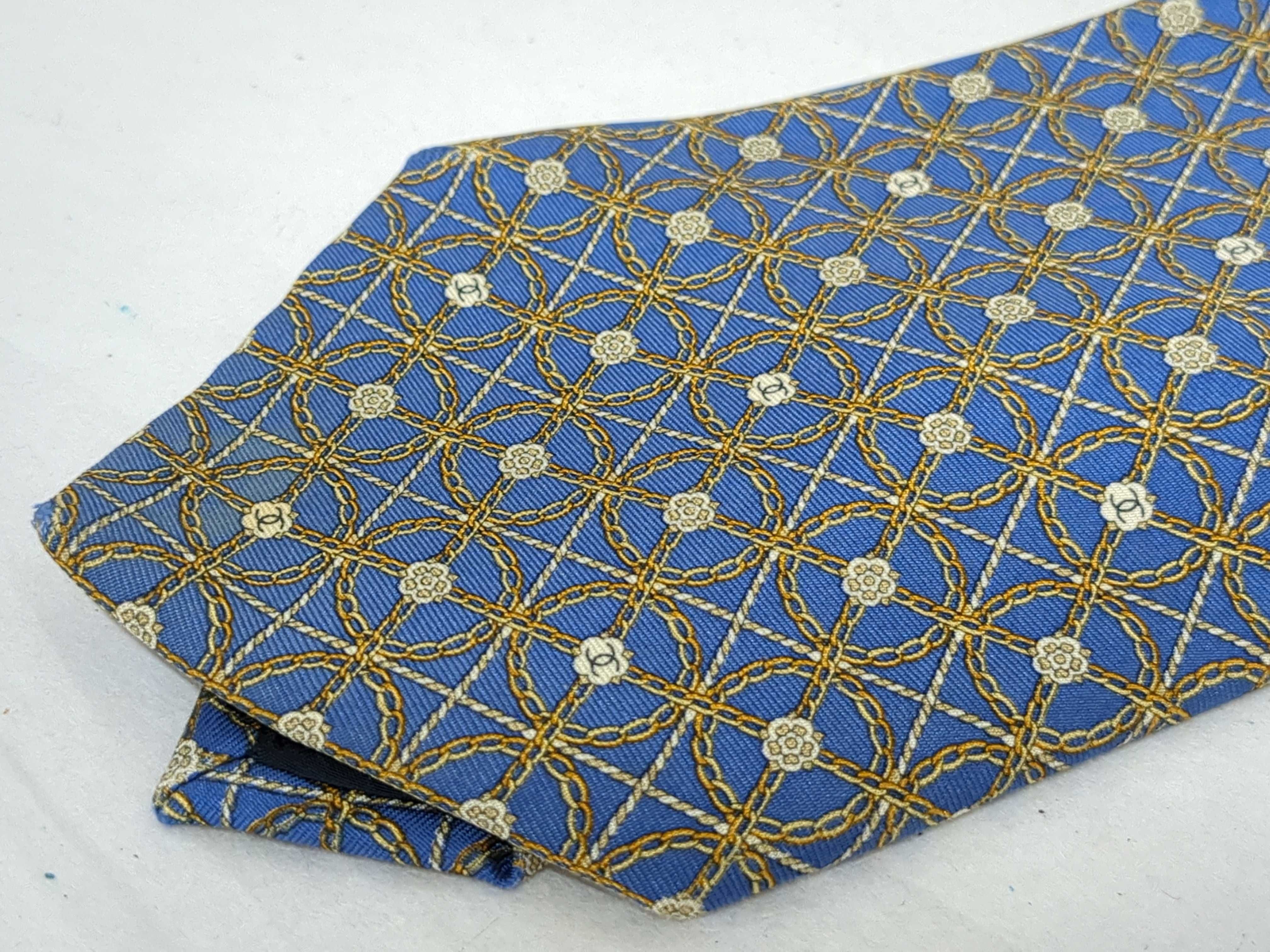An Assortment of Men's Silk Designer Neckties Including Hermes and Chanel