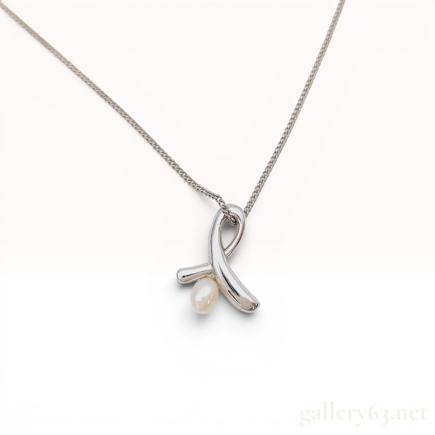 Tasaki Silver and Pearl Ribbon Motif Pendant Necklace