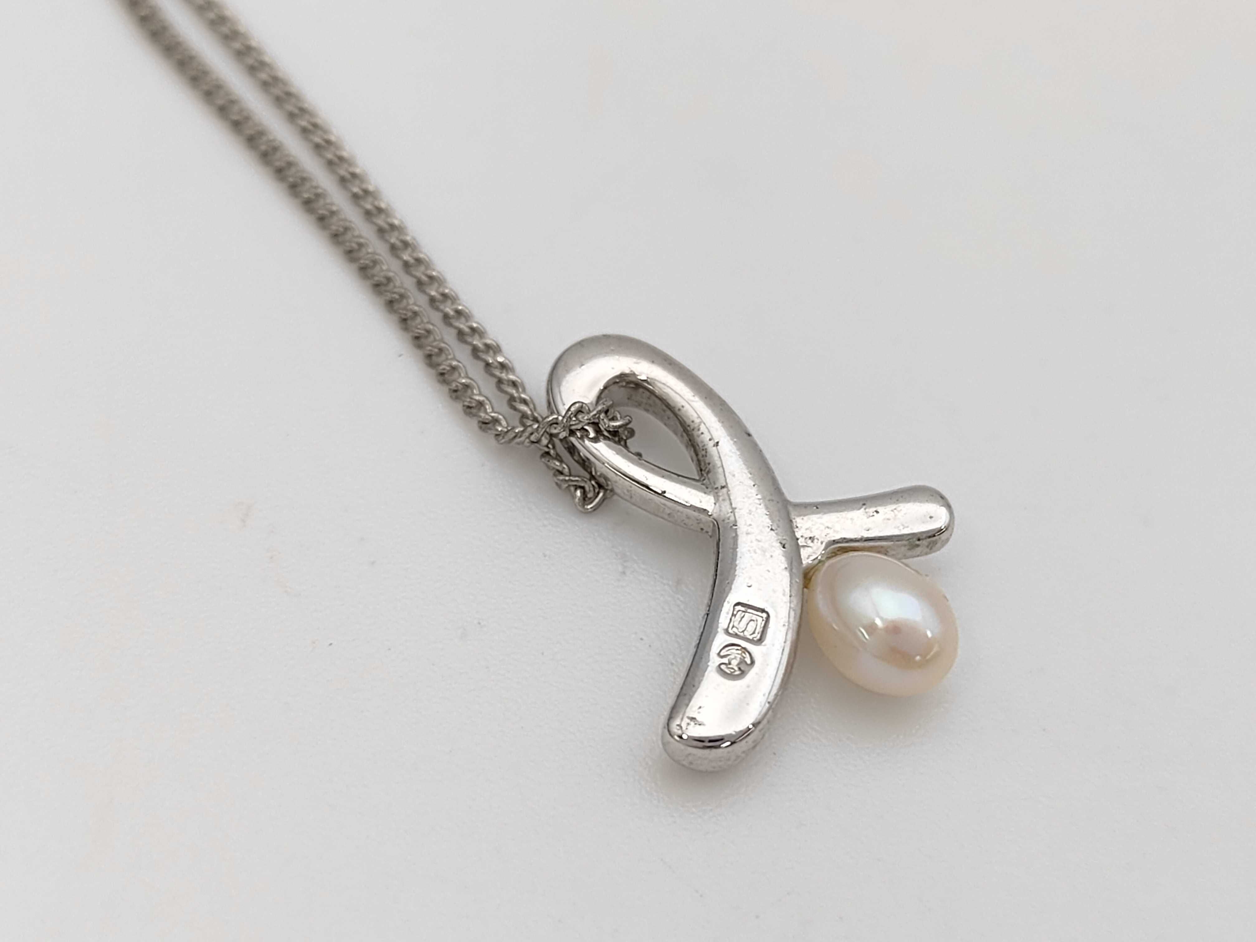 Tasaki Silver and Pearl Ribbon Motif Pendant Necklace