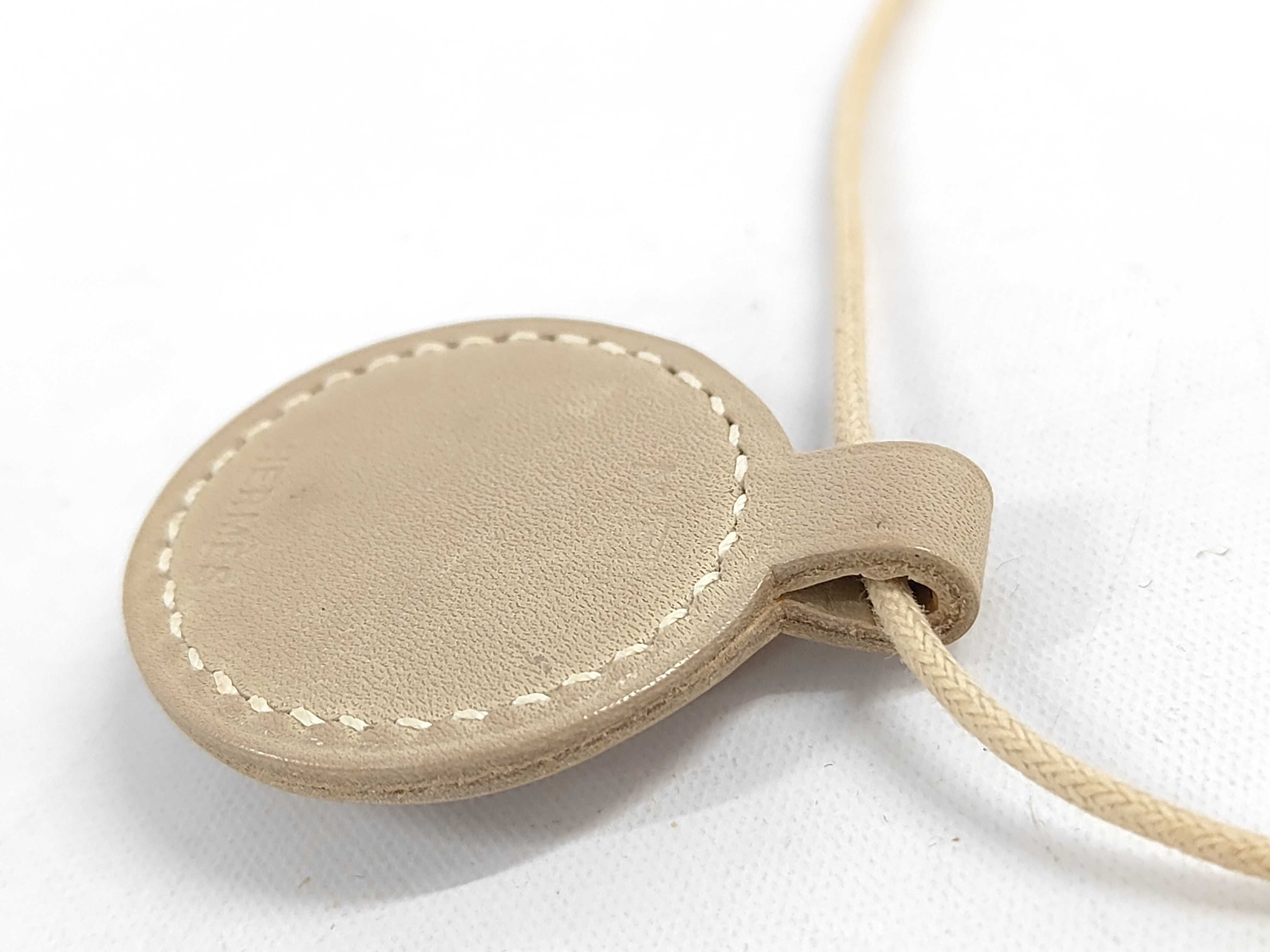 Hermes Leather and Metal Talisman Pendant Necklace, 2009
