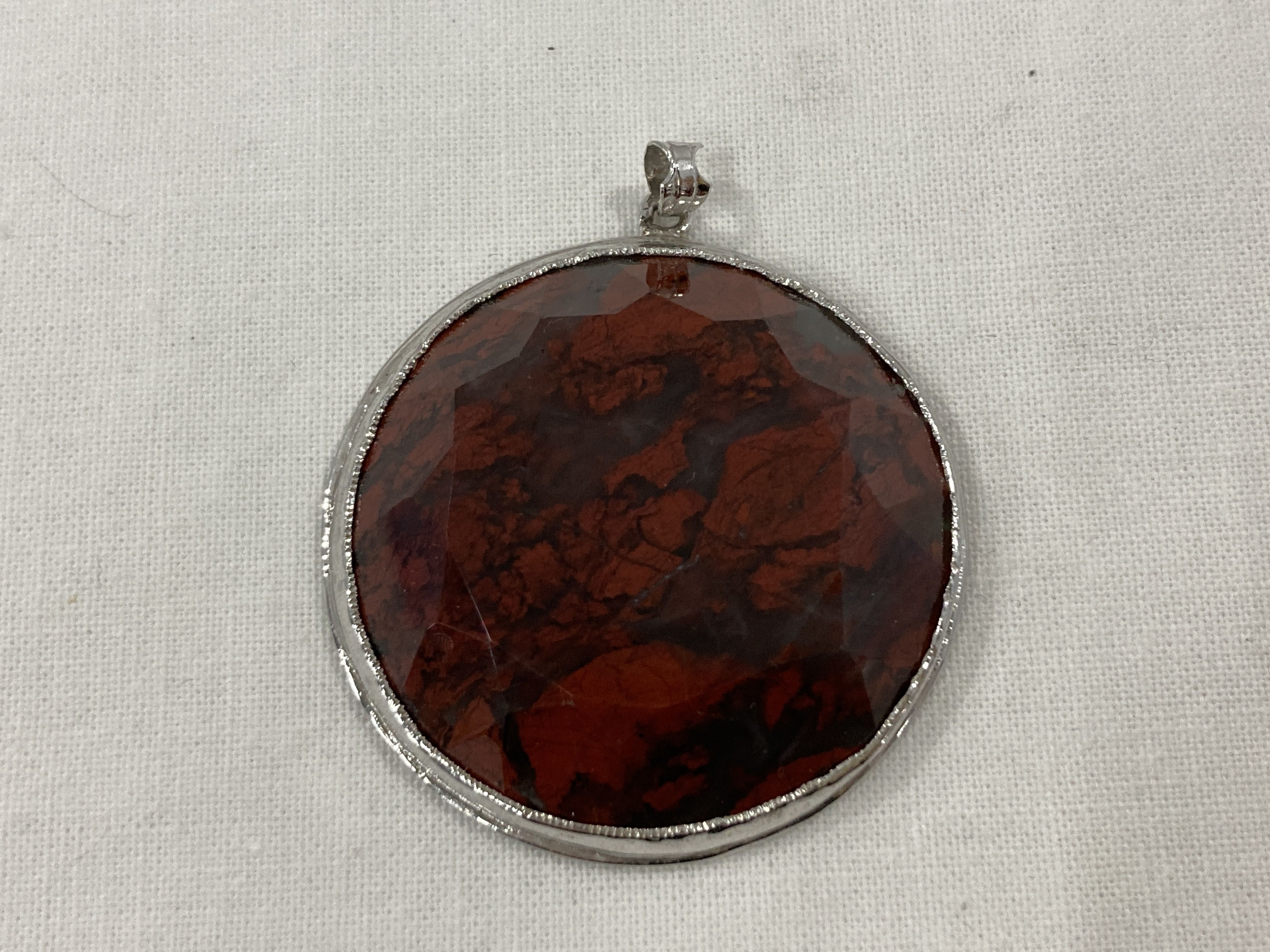 Silver Rhodonite Cocktail Ring and Faceted Garnet Pendant