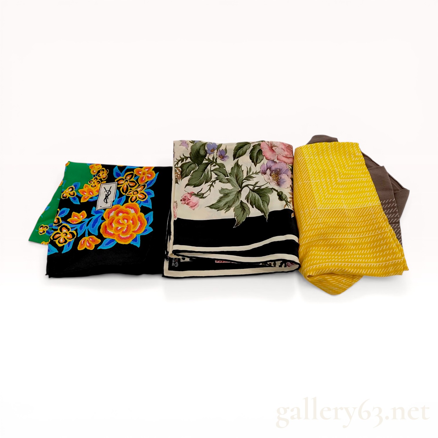 A Trio of Vintage Silk Scarves Including Two Yves Saint Laurent Examples