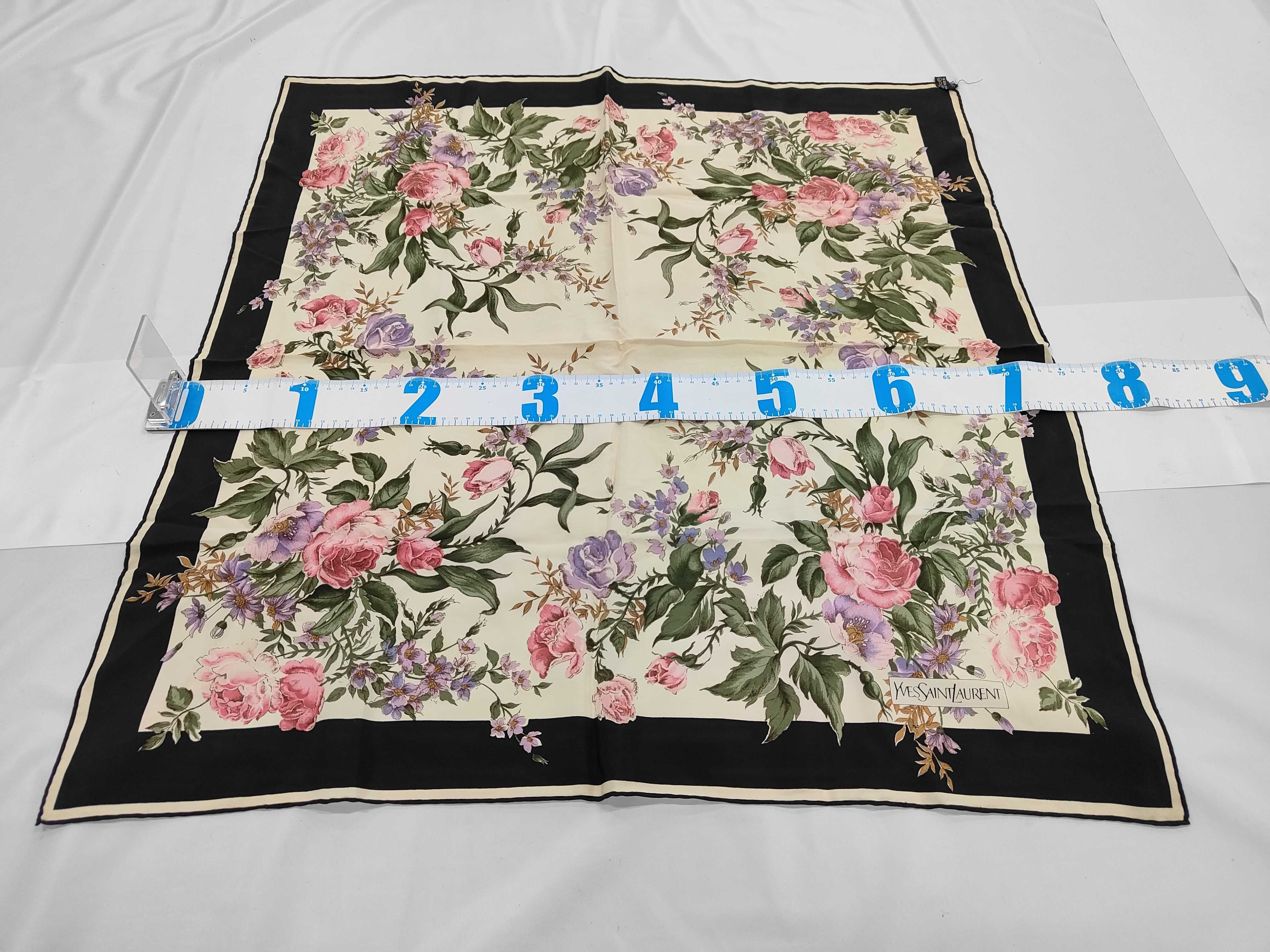 A Trio of Vintage Silk Scarves Including Two Yves Saint Laurent Examples