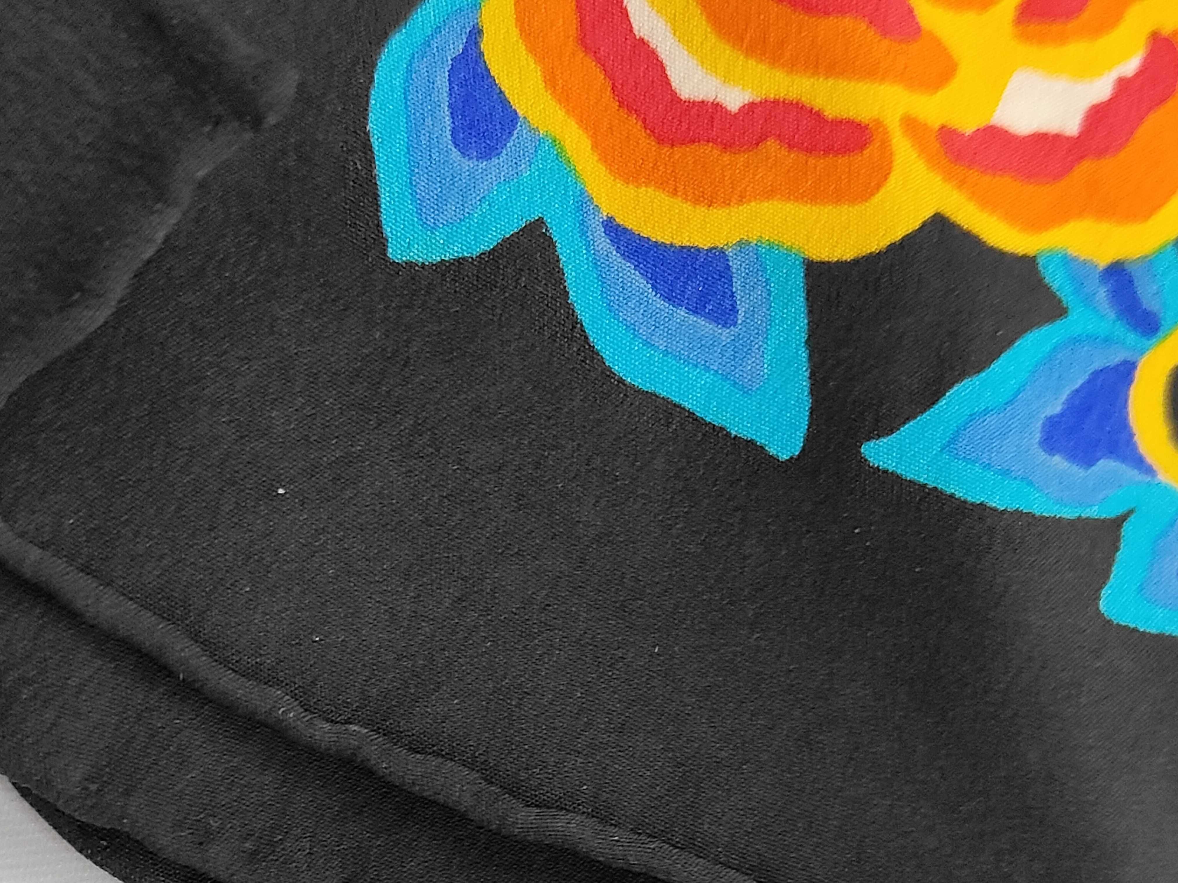 A Trio of Vintage Silk Scarves Including Two Yves Saint Laurent Examples