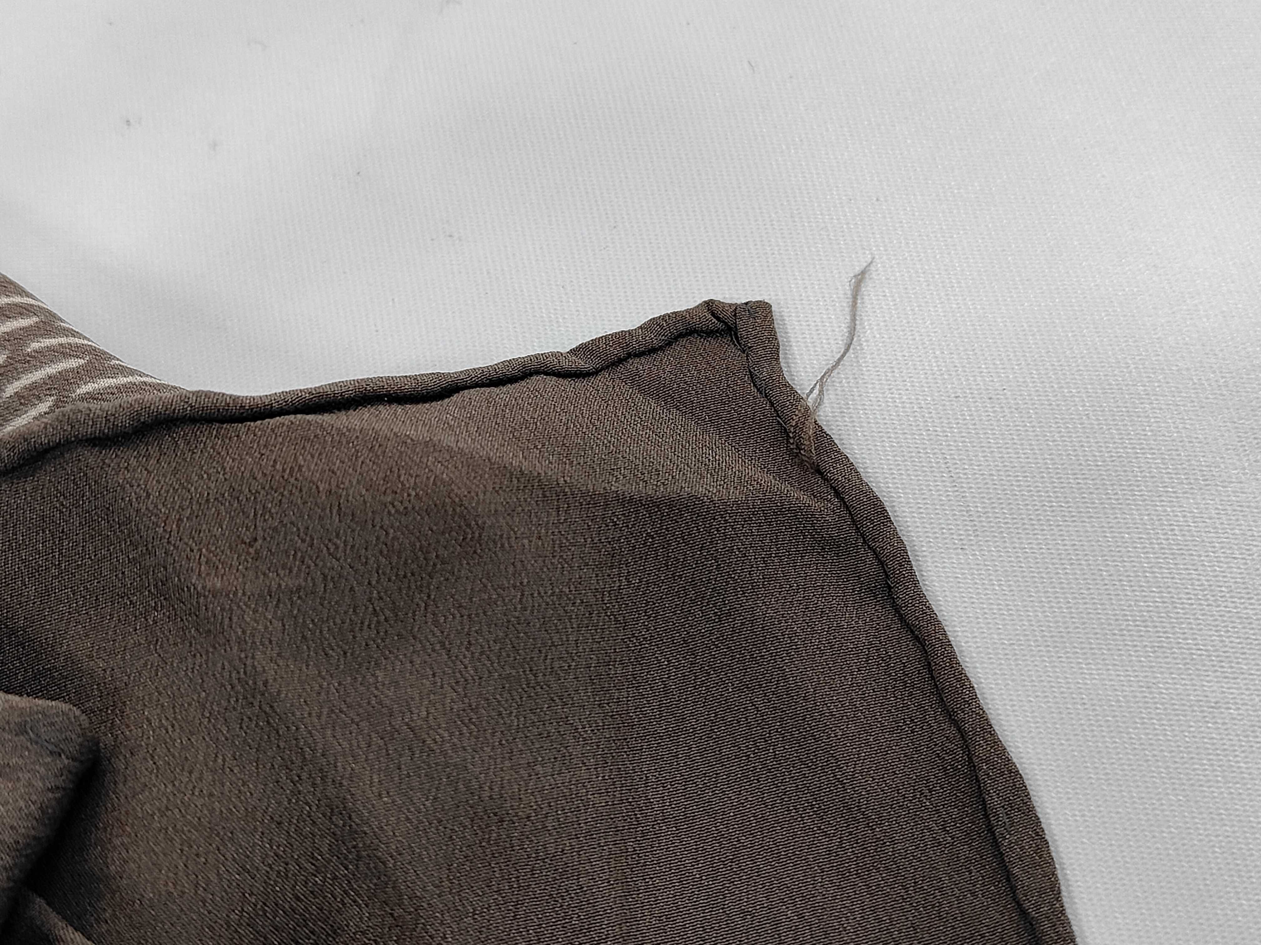 A Trio of Vintage Silk Scarves Including Two Yves Saint Laurent Examples