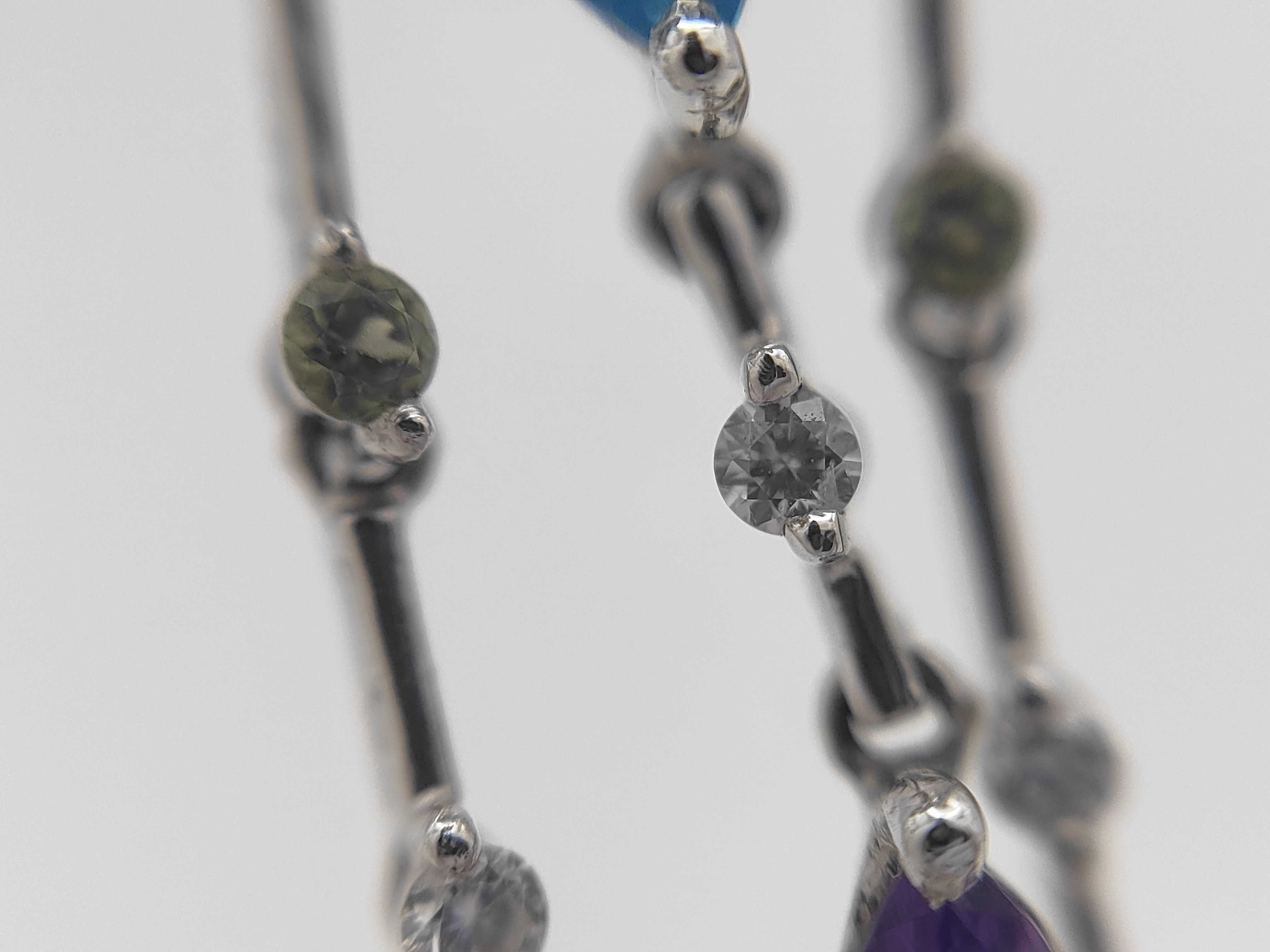A Pair of 18K White Gold Multi-Gemstone Articulated Drop Earrings