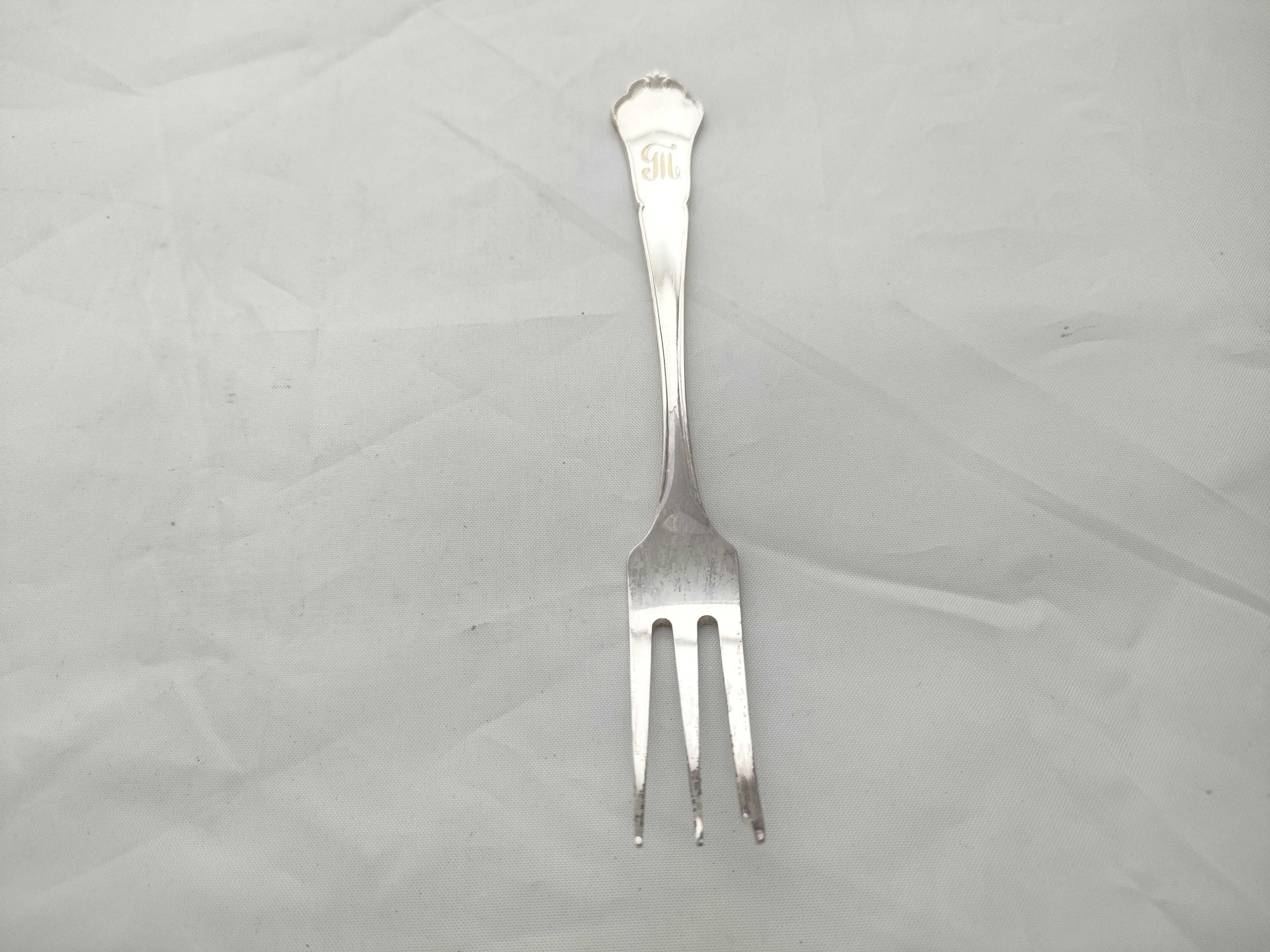 A Set of Nine 830 Silver Three-Tine Forks with Shell Terminals, Late 19th-early 20th C.